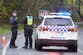 Man charged with murder of wife and two sons after calling police to their home in Australia