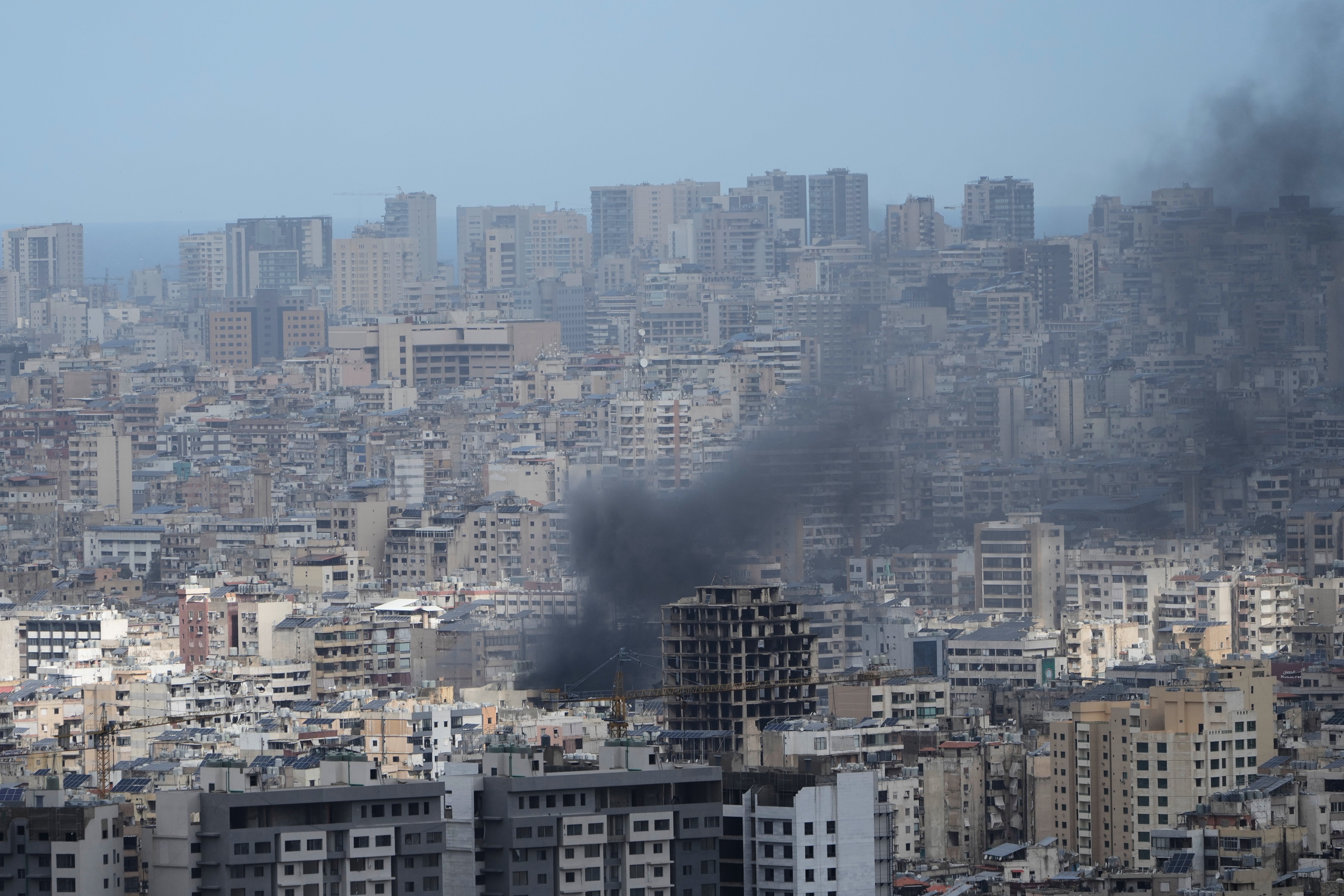 Smoke rises following an Israeli airstrike in Dahiyeh, Beirut's southern suburbs, Lebanon, on Monday