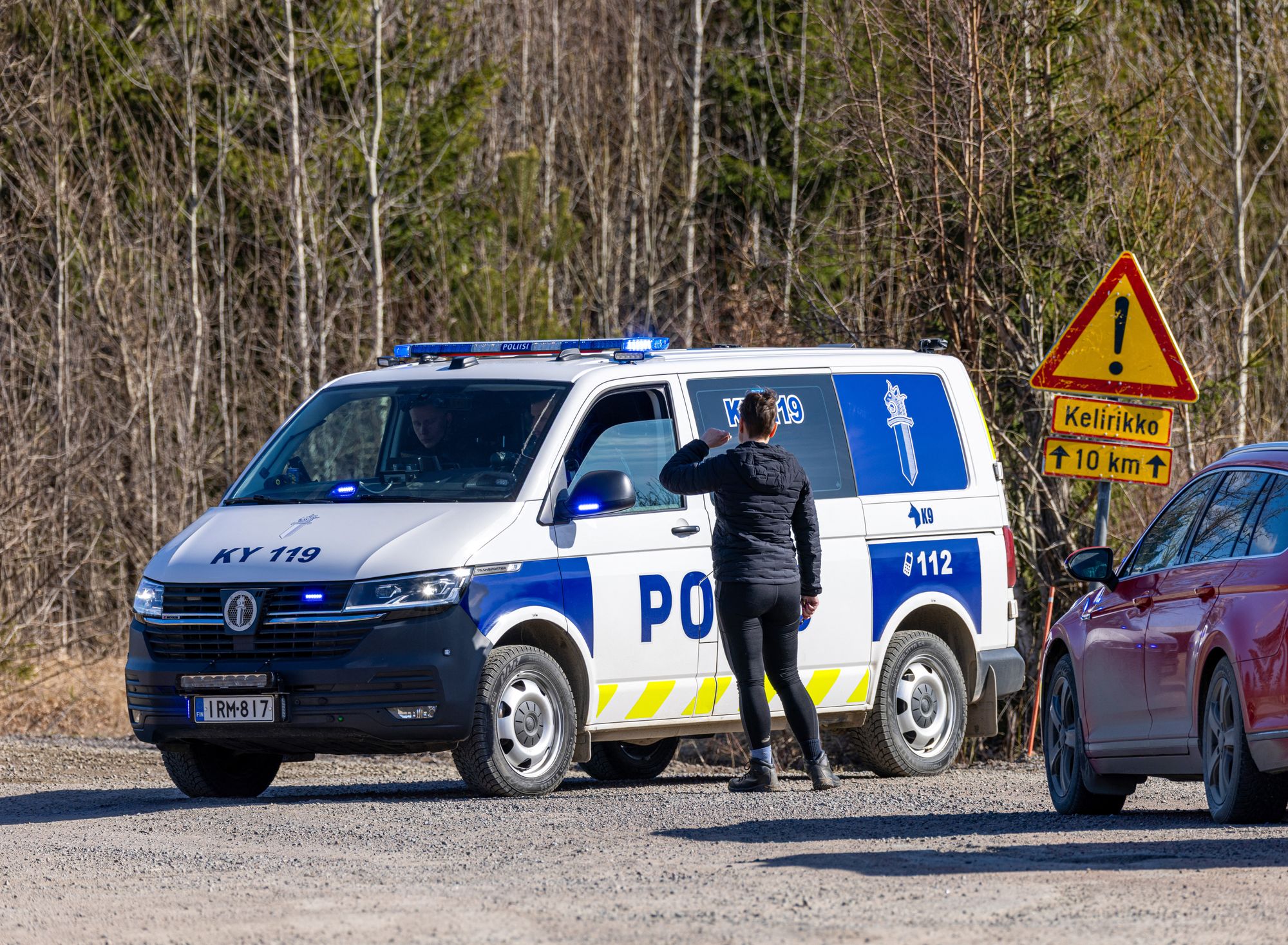 A police vehicle blocks access to the Savistontie road near Kouvola, south-eastern Finland after the crash of two unidentified drones