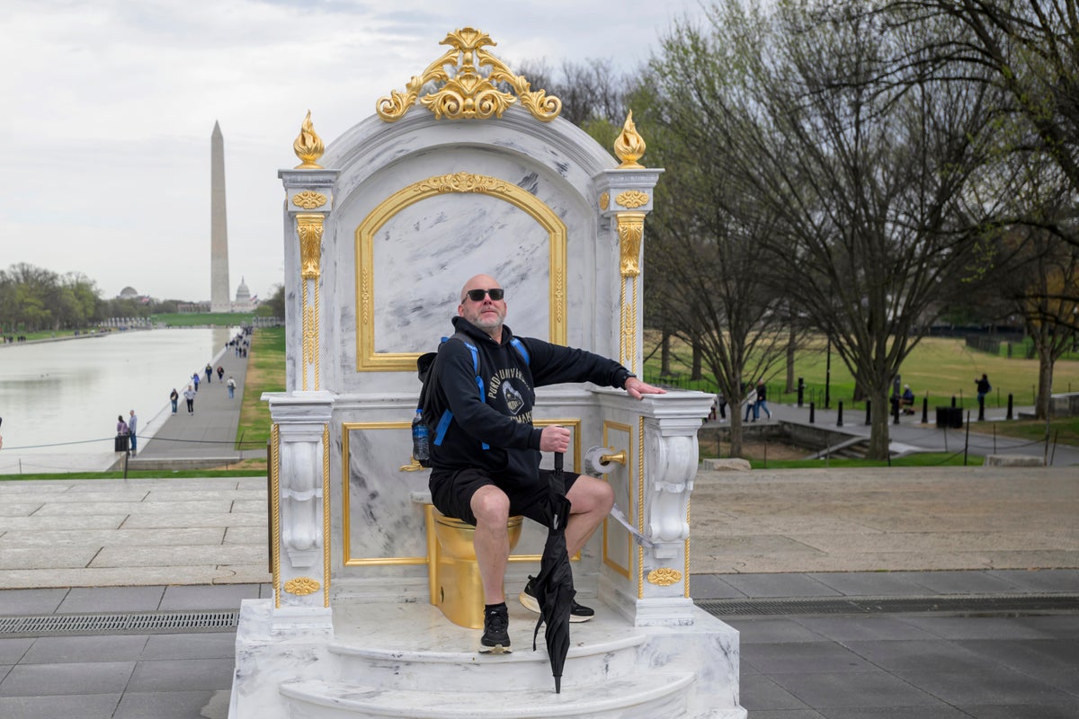 Massive golden toilet statue mocks Trump’s White House renovations