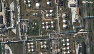 A satellite image shows the same Russian oil refinery in Yaroslavl in August last year