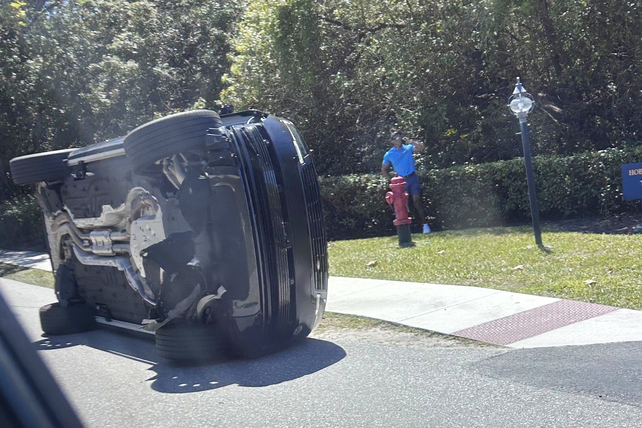 The golfer was traveling at high speeds on a beachside, residential road on Jupiter Island when his Land Rover clipped the truck and rolled onto its side