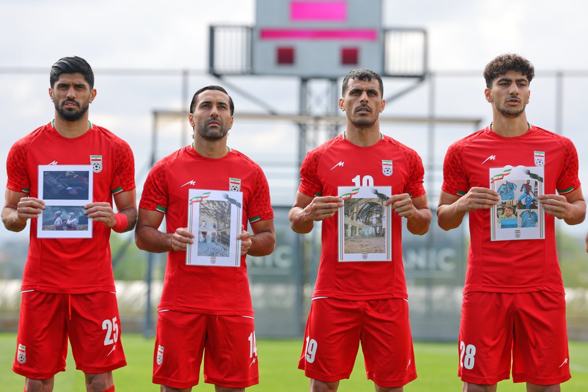 Iran soccer players honor alleged child victims of the war before World Cup warmup
