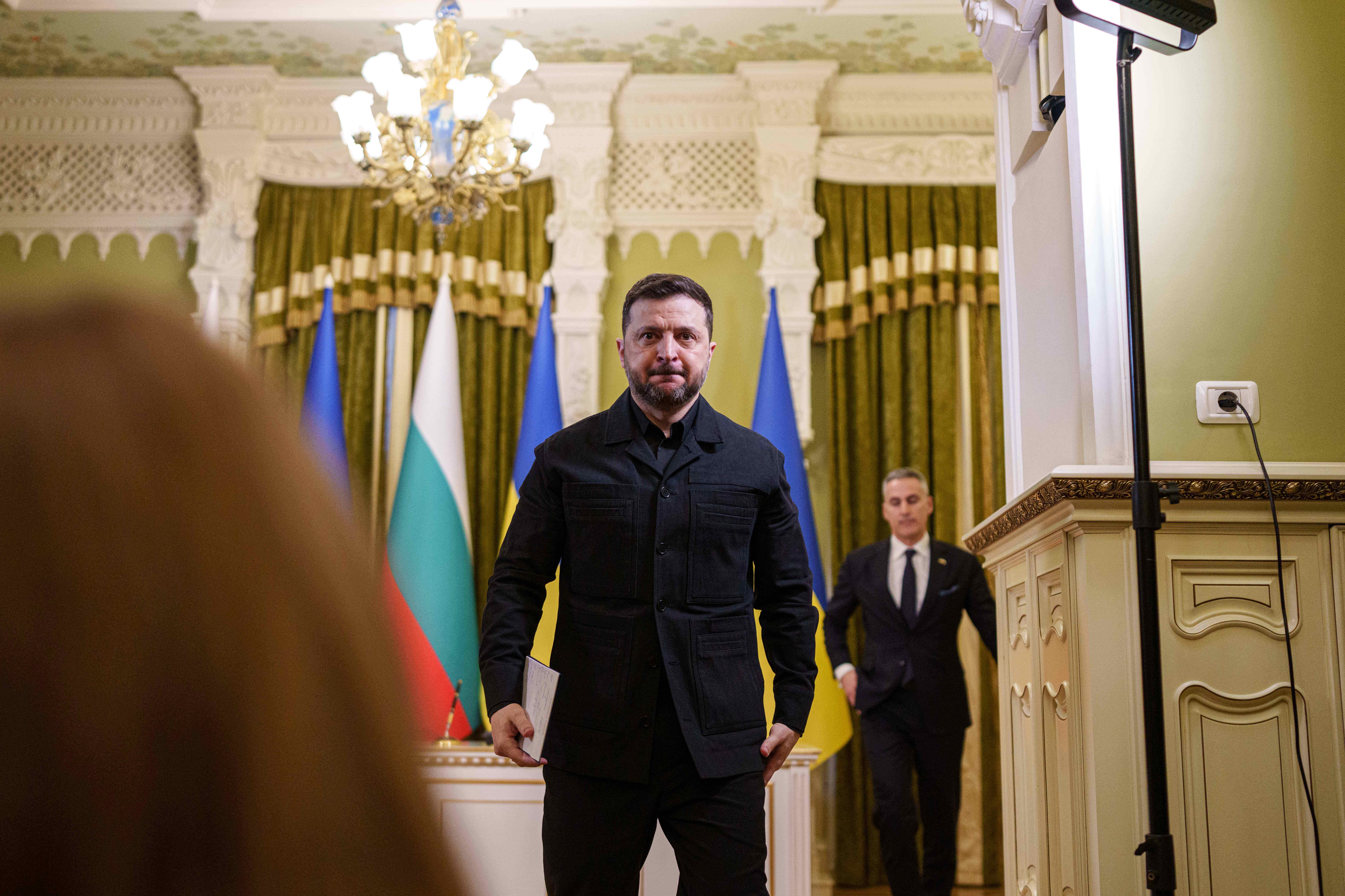 Ukraine's president Volodymyr Zelensky walks after a joint press conference in Kyiv