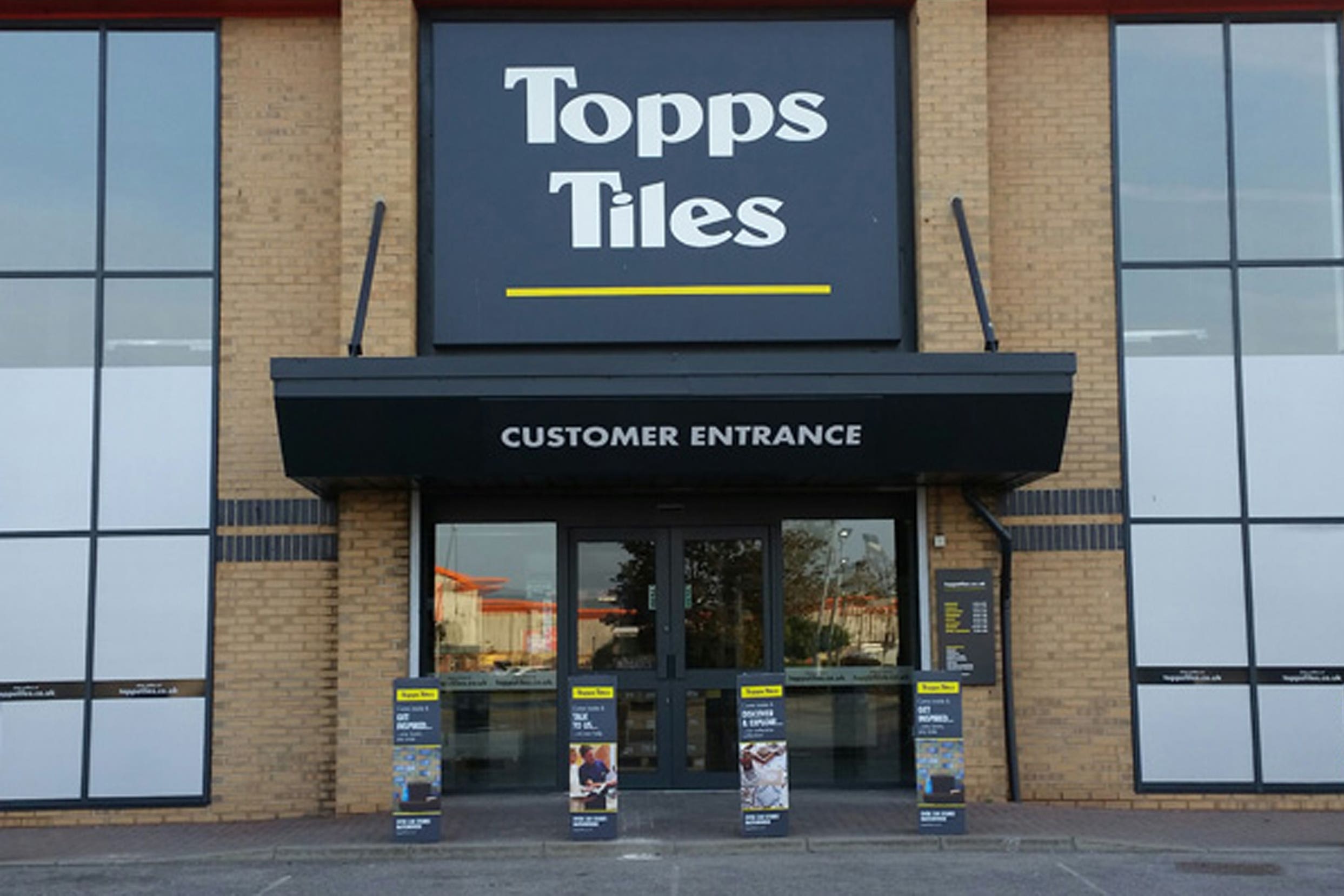 Topps Tiles has announced 23 stores are being closed (Topps Tiles/PA)