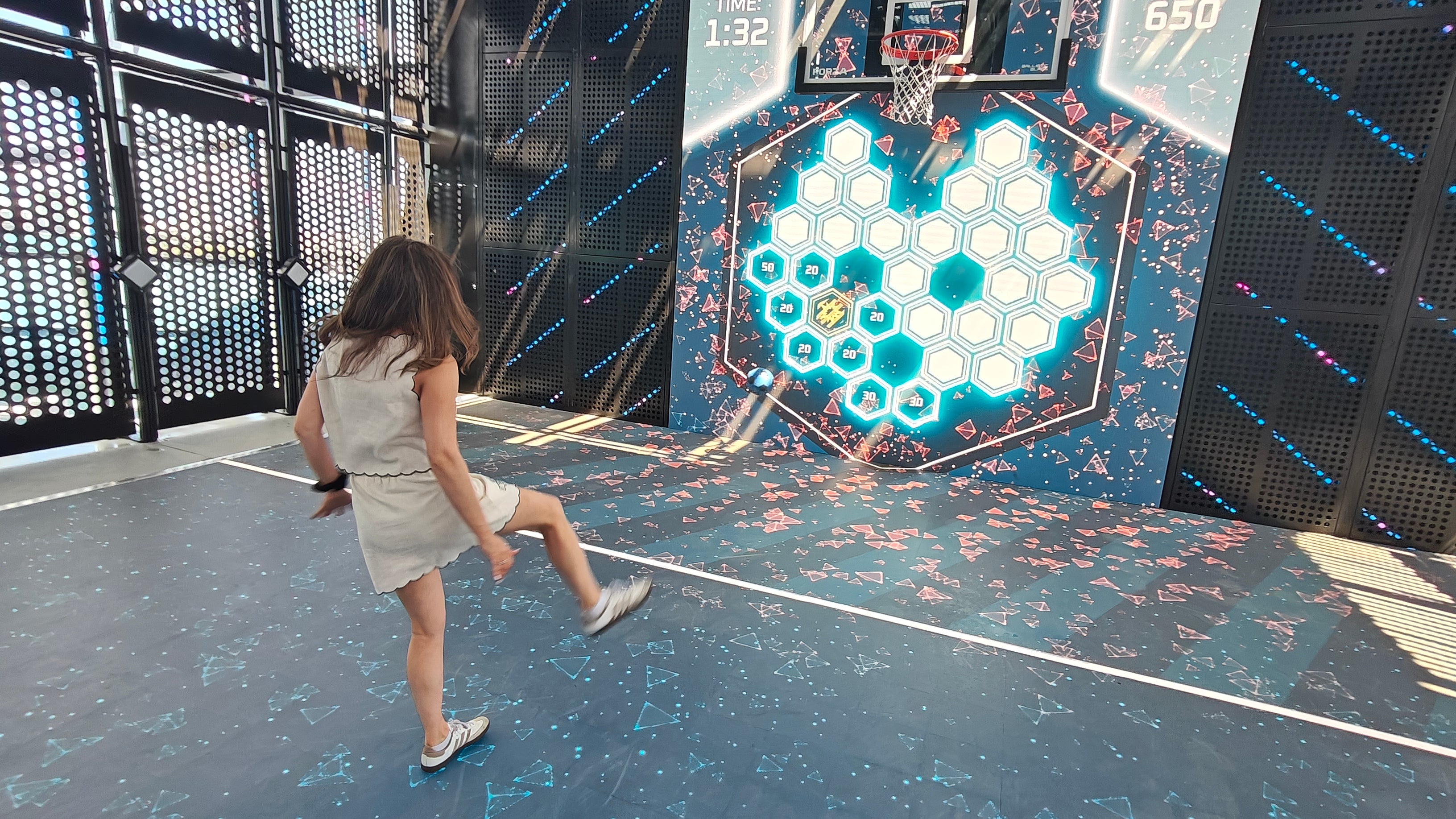 The Glow Court is a fun space for interactive games aboard Norwegian Luna