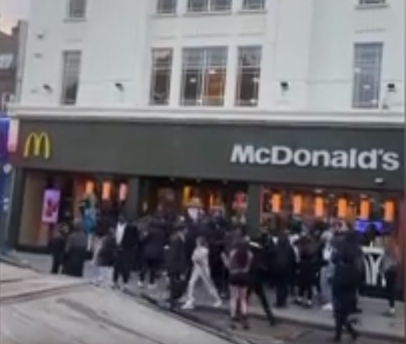 Videos on social media show large group of teenagers outside McDonalds
