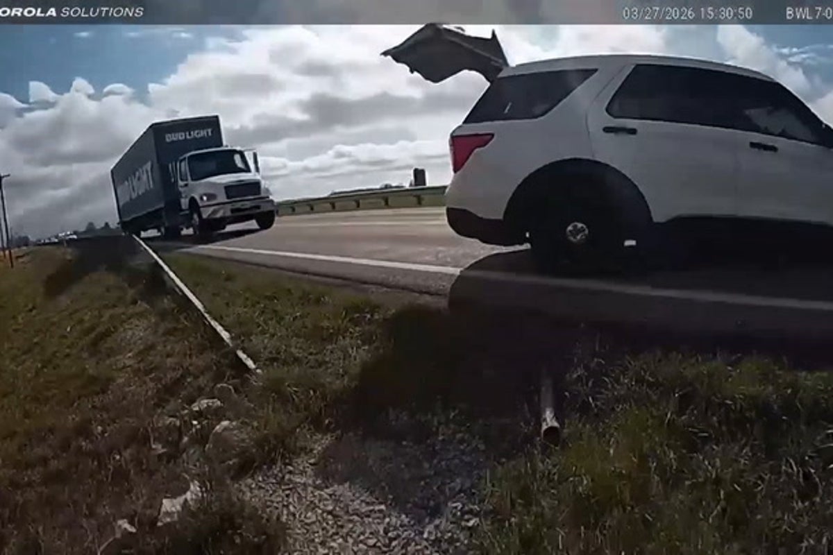 Watch as stolen truck containing popular beer crashes into police car
