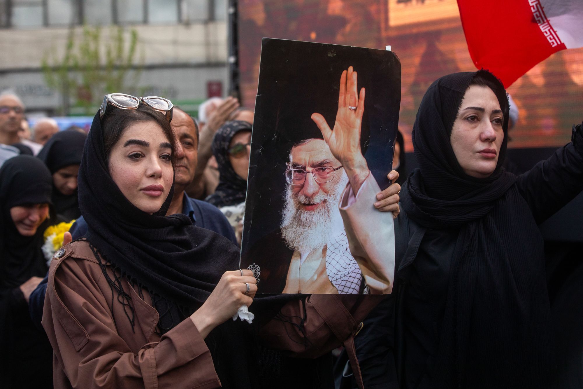 Mourners at a funeral procession held for IRGC Navy Chief Alireza Tangsiri, alongside other senior naval commanders and their families