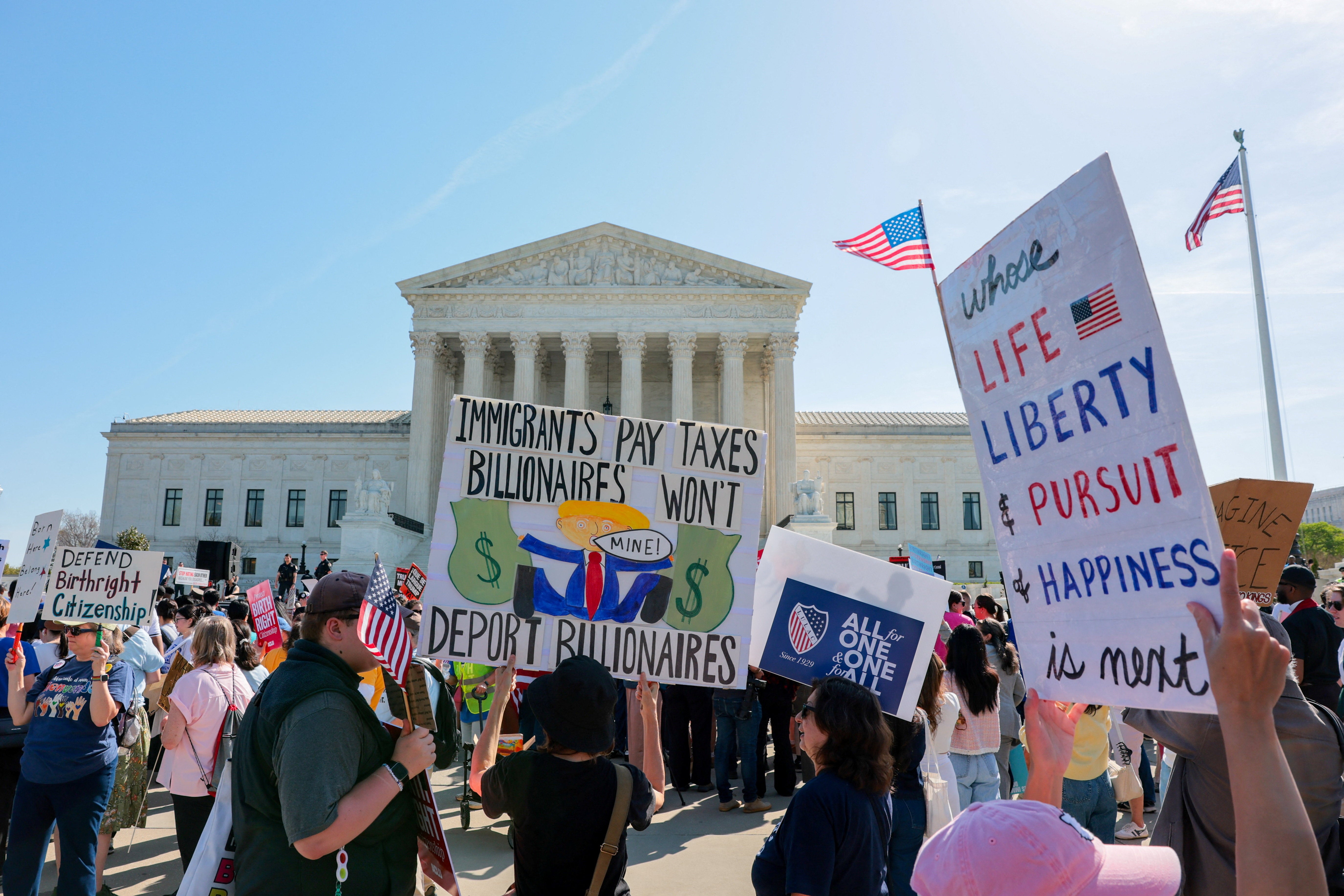 Protesters rallied outside the Supreme Court, which is expected to deliver a decision by June or July