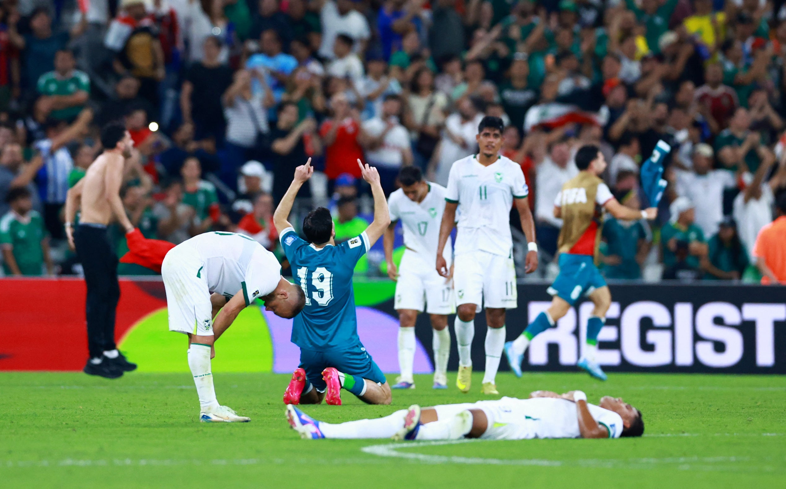 Bolivia players look dejected as they lose their play-off final