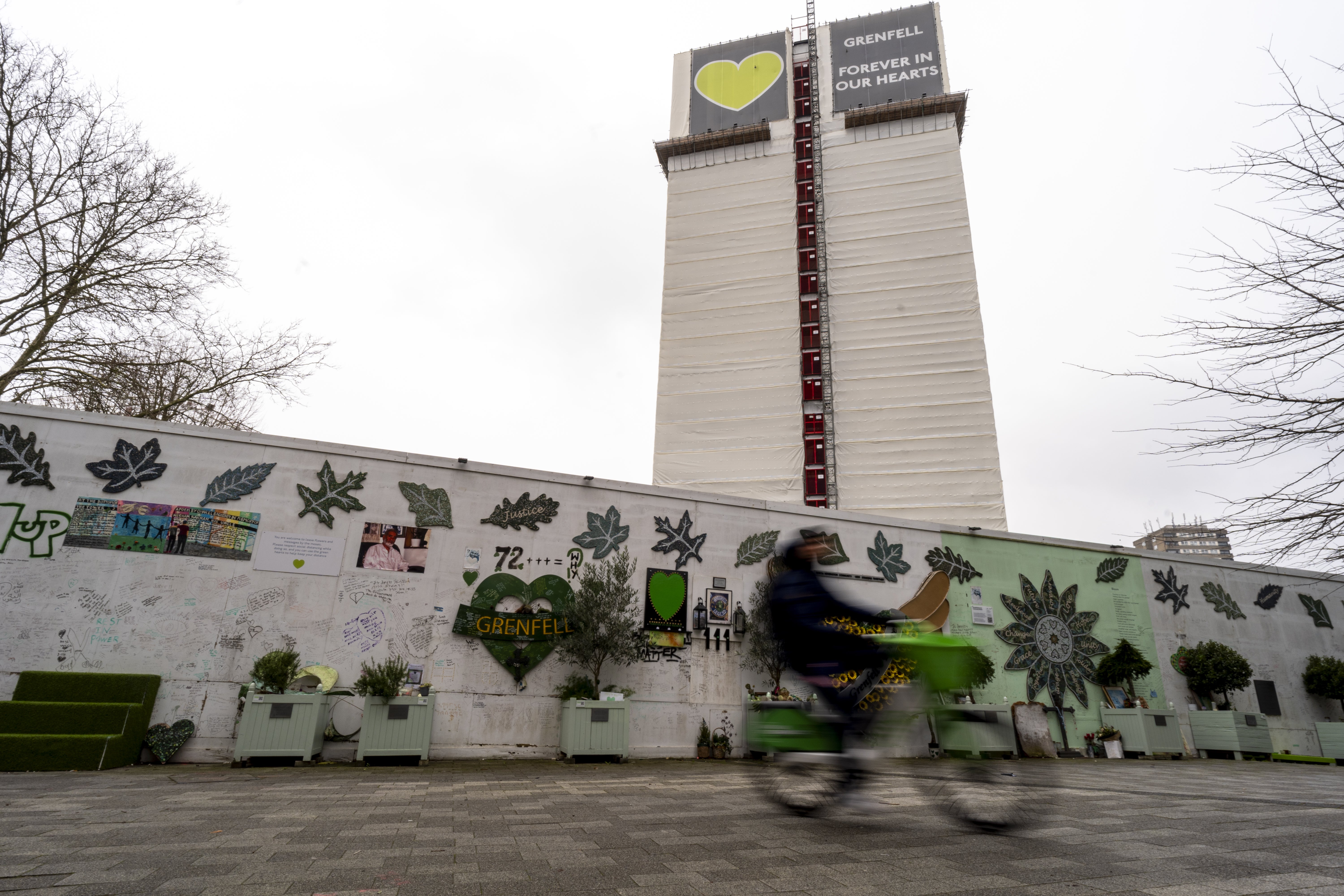 The memorial beneath Grenfell Tower, in west London (PA)