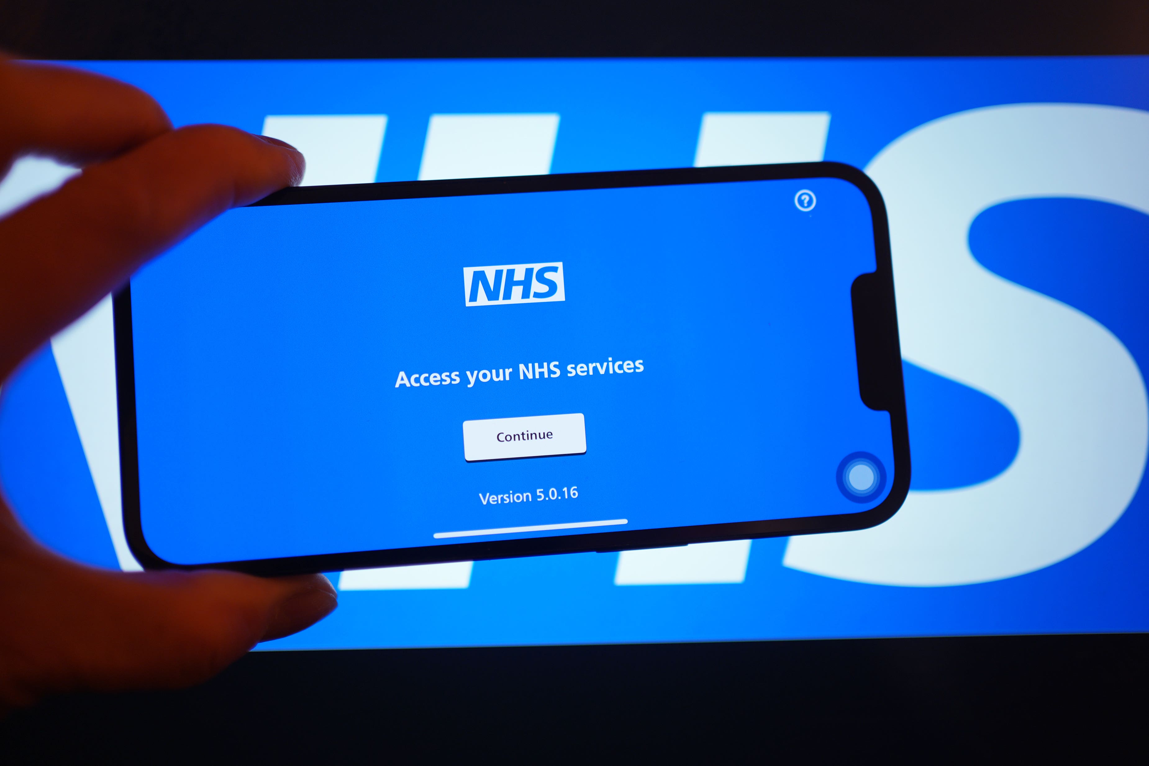 The plans would allow people to order tests in seven specialities, complete them and receive results using the NHS app. (Yui Mok/PA)