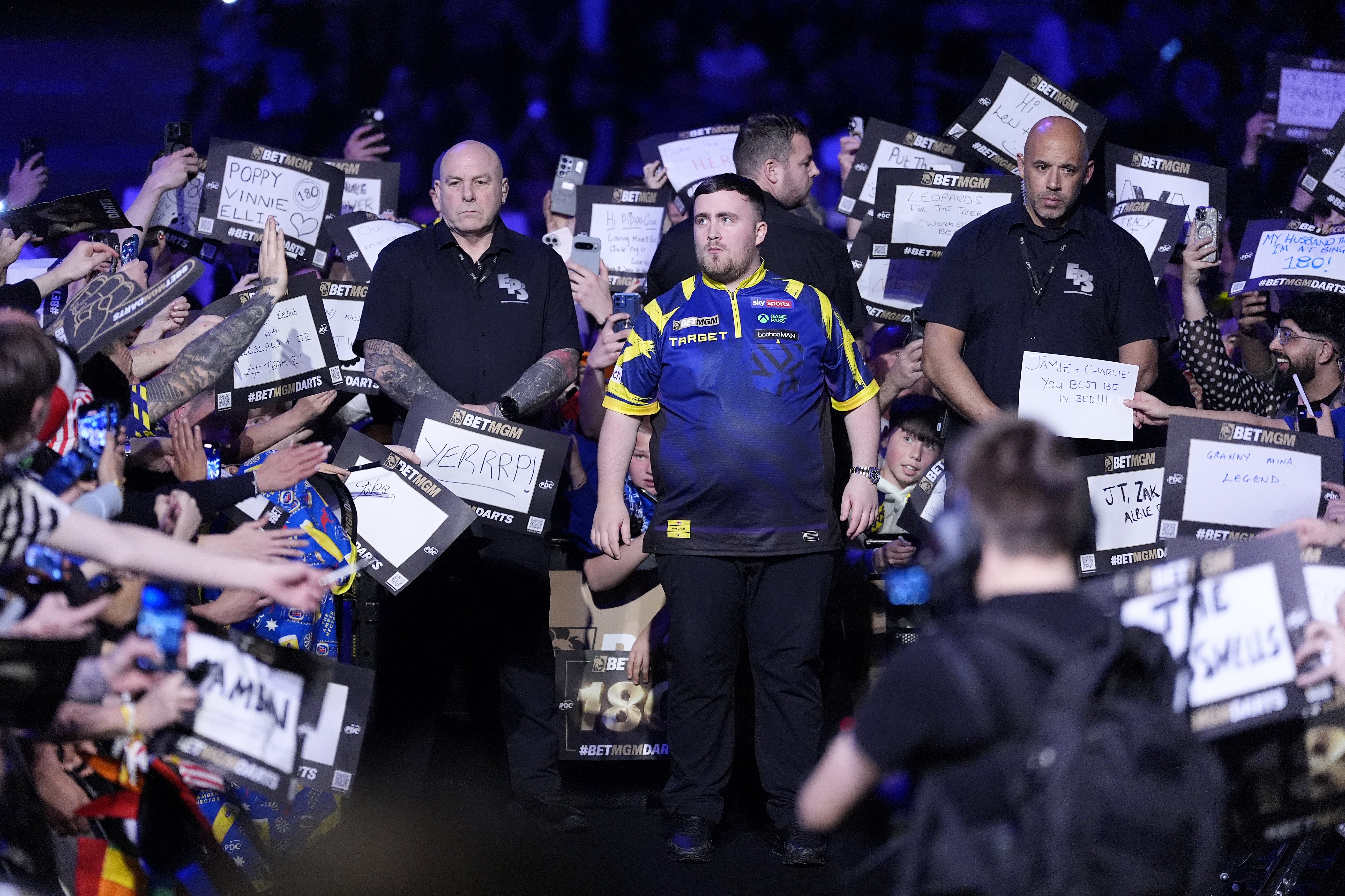 Littler walks out at the AO Arena (Peter Byrne/PA)