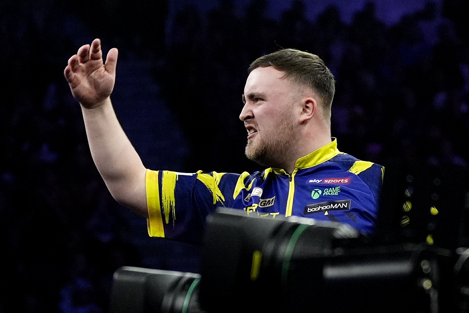 Luke Littler gestures towards Gian van Veen (Peter Byrne/PA)