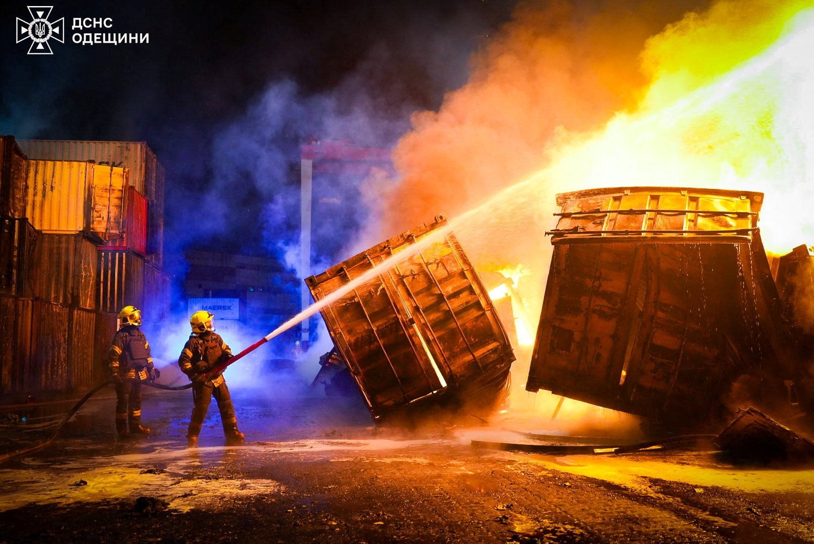 Firefighters work at the site of a Russian drone strike in Odesa