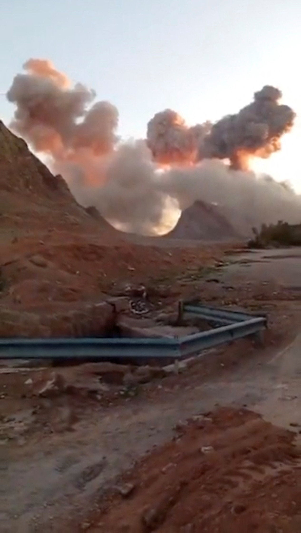 Plumes of smoke rise following a reported strike, amid the US-Israeli conflict with Iran, in Baharestan, Isfahan province, Iran, in this screengrab taken from a social media video released on 1 April 2026