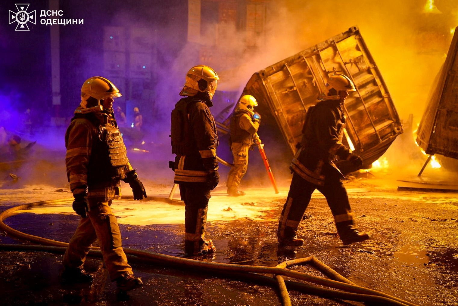 Firefighters works at the site of a Russian drone strike amid Russia's attack on Ukraine in Odesa region