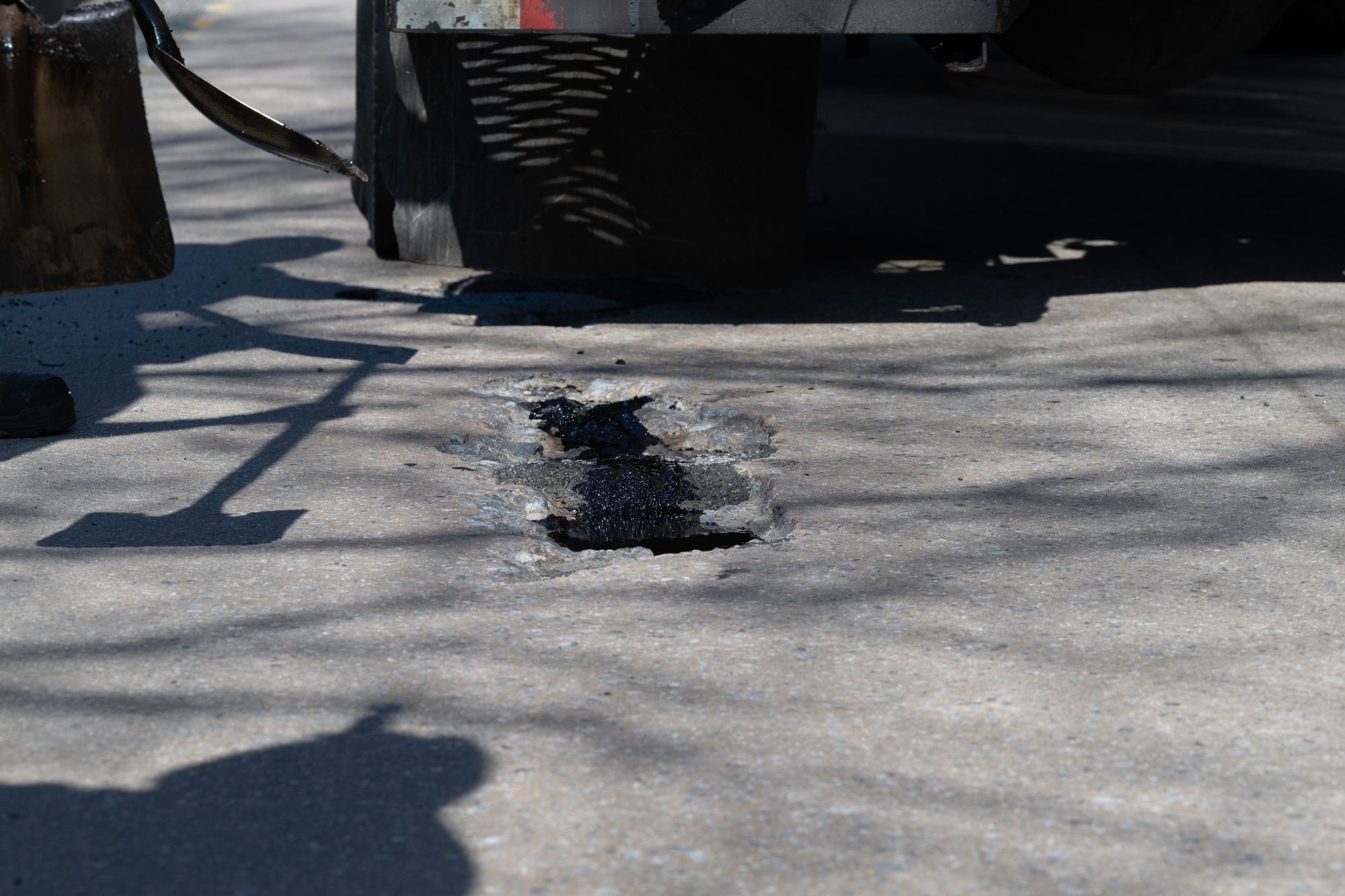 A pothole is seen on a Baltimore road on March 10. Baltimore Mayor Brandon Scott said the Maryland city is still dealing with the aftermath of “ice-mageddon”, even in early spring. Baltimore is used to heavy snow that then rapidly melts but low temperatures in late January and February kept ice intact for weeks.