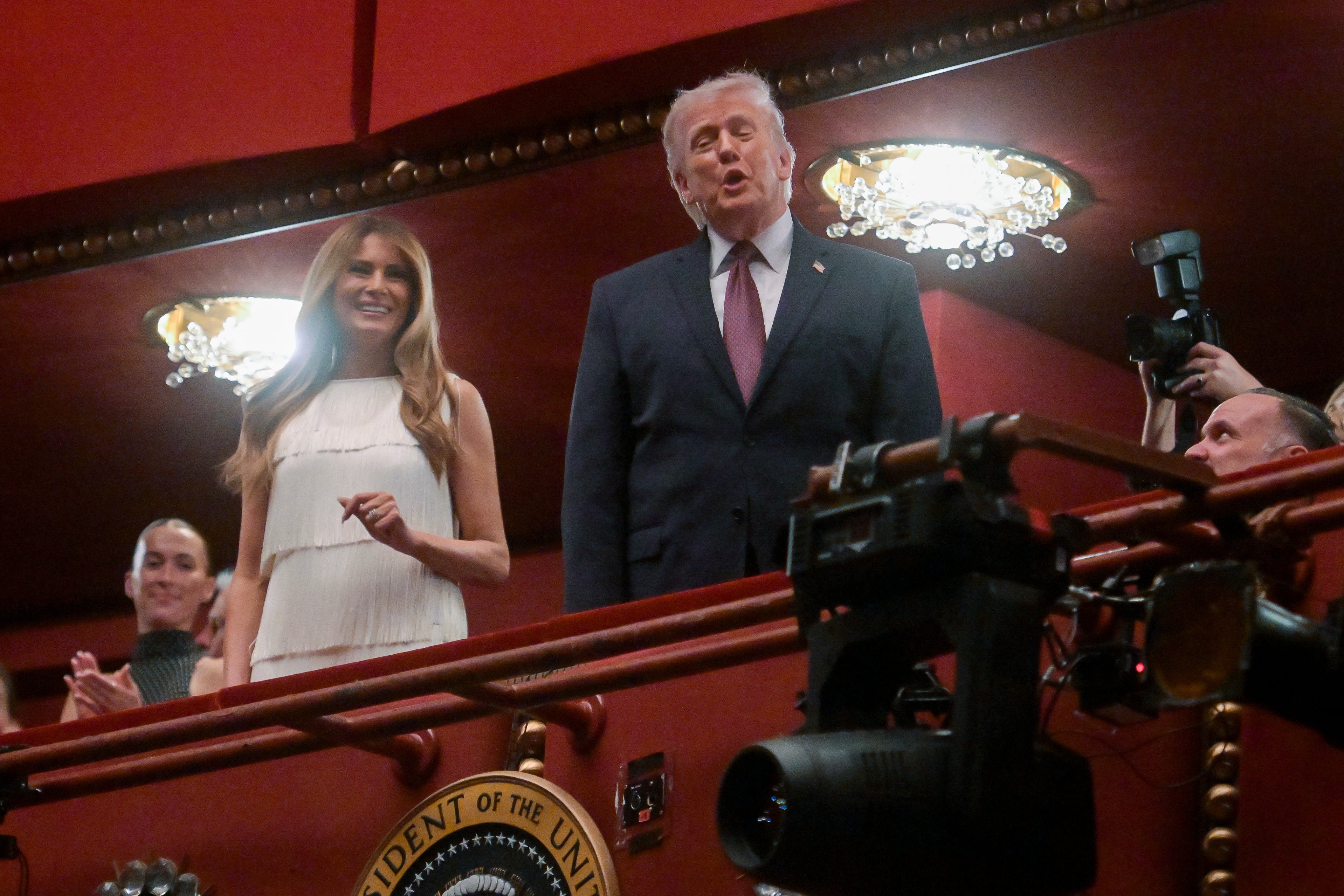 President Donald Trump, right, and first lady Melania Trump arrive at the John F Kennedy Center for the Performing Arts, to attend the opening night of the musical 'Chicago' in Washington, Tuesday, 31 March 2026