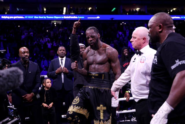 <p>Deontay Wilder celebrates a narrow win over Derek Chisora</p>