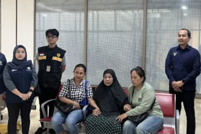 Indonesian grandmother freed from Malaysia death row after 15 years returns home