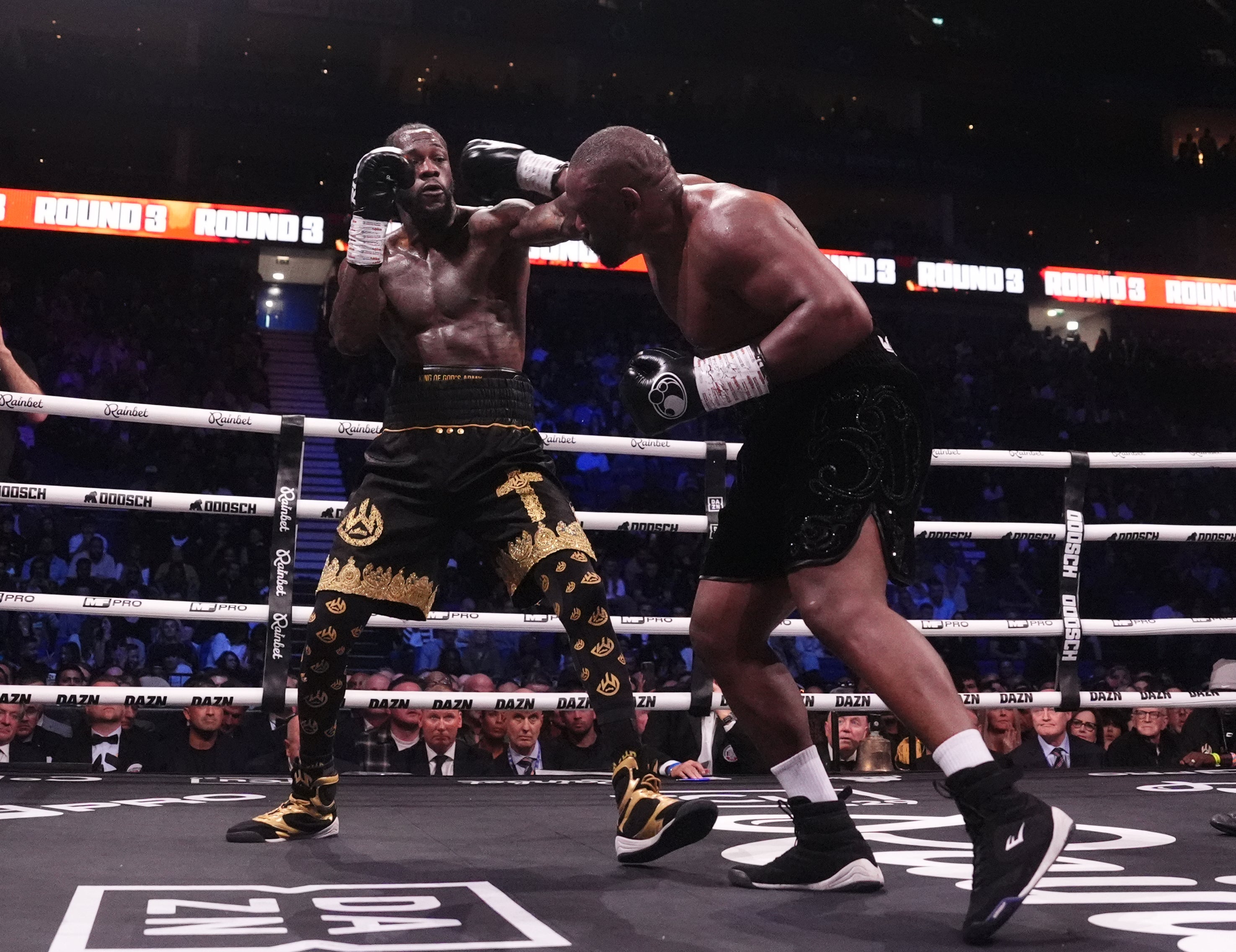 Chisora, right, and Wilder entertained the O2 Arena (Adam Davy/PA)