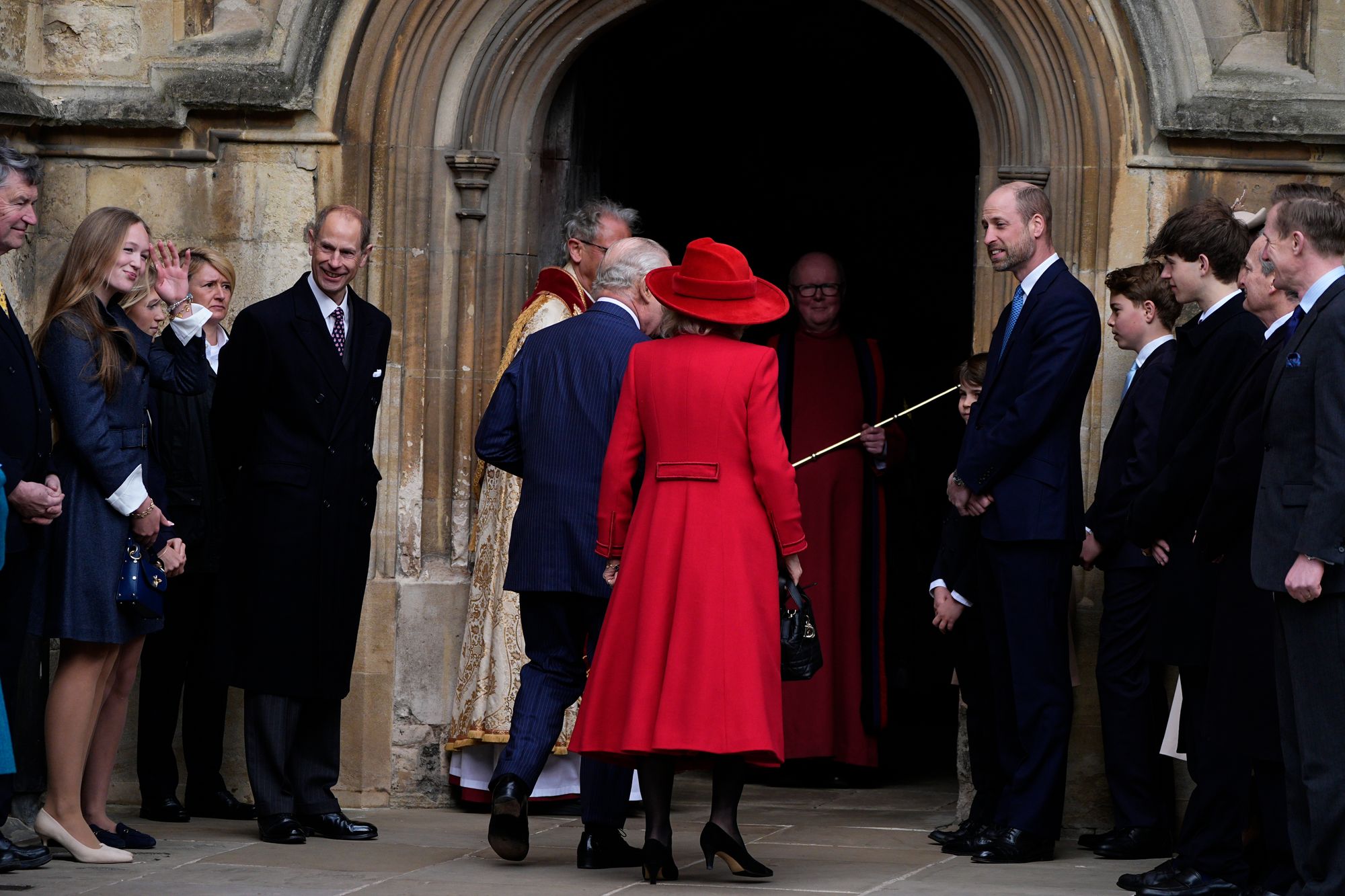 King Charles III and Queen Camilla flanked by other members of the royal family arrive to attend the Easter Service
