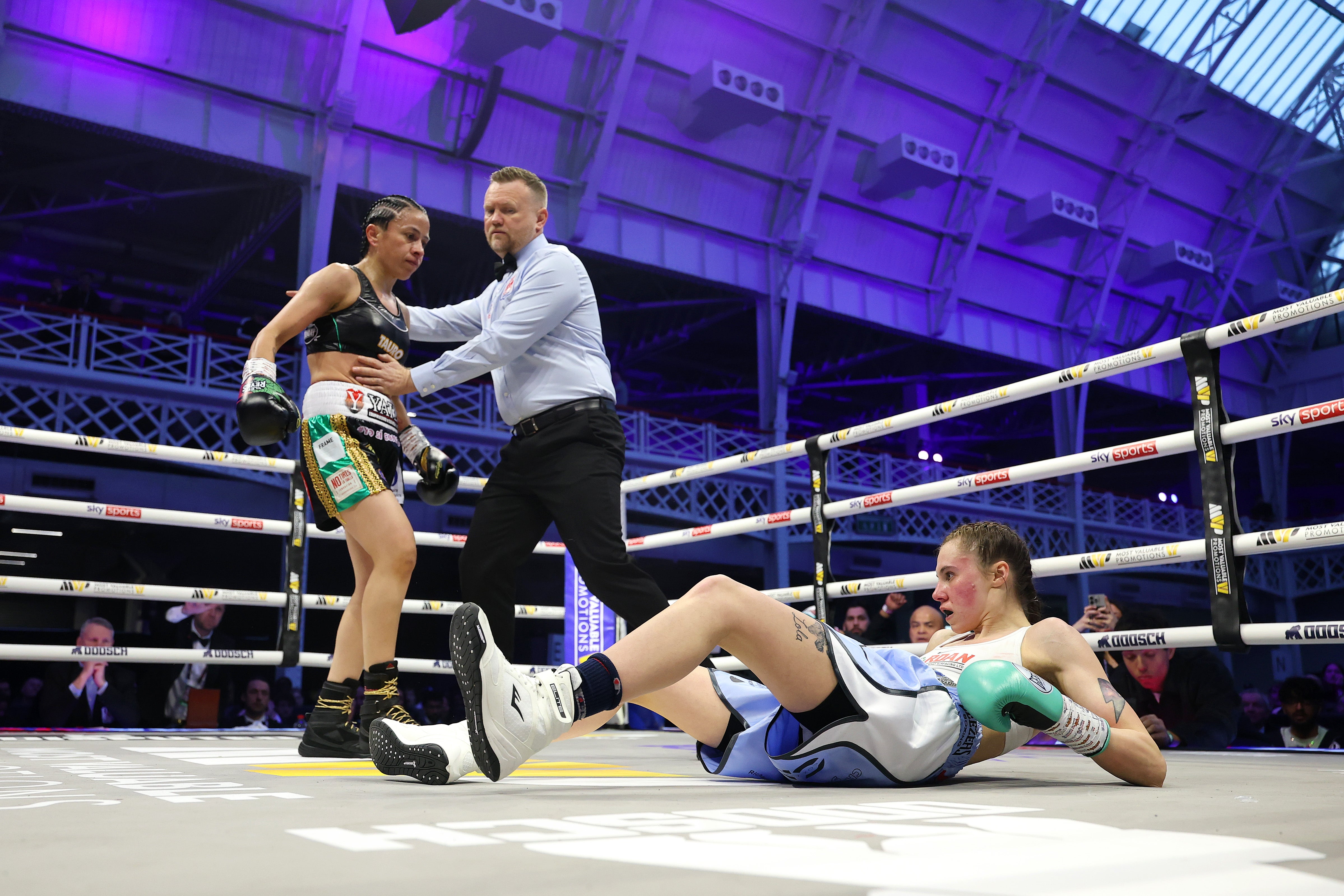 Emma Dolan (right) suffered a surprise stoppage loss to Irma Garcia