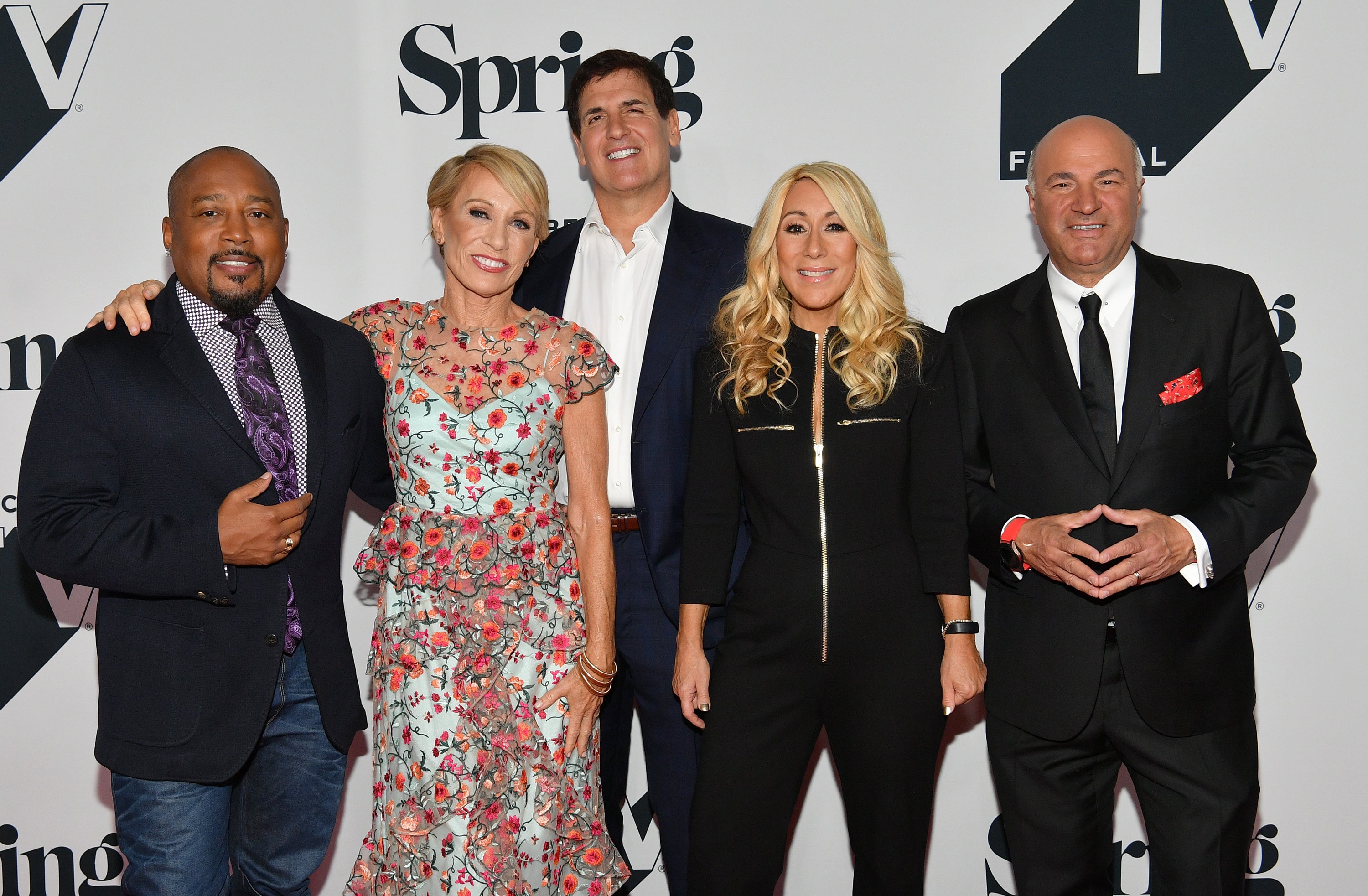 John (left), seen here with fellow 'sharks' Barbara Corcoran, Mark Cuban, Lori Greiner, and Kevin O'Leary, is suing a pair of entrepreneurs he claims ripped him off to the tune of tens of millions of dollars
