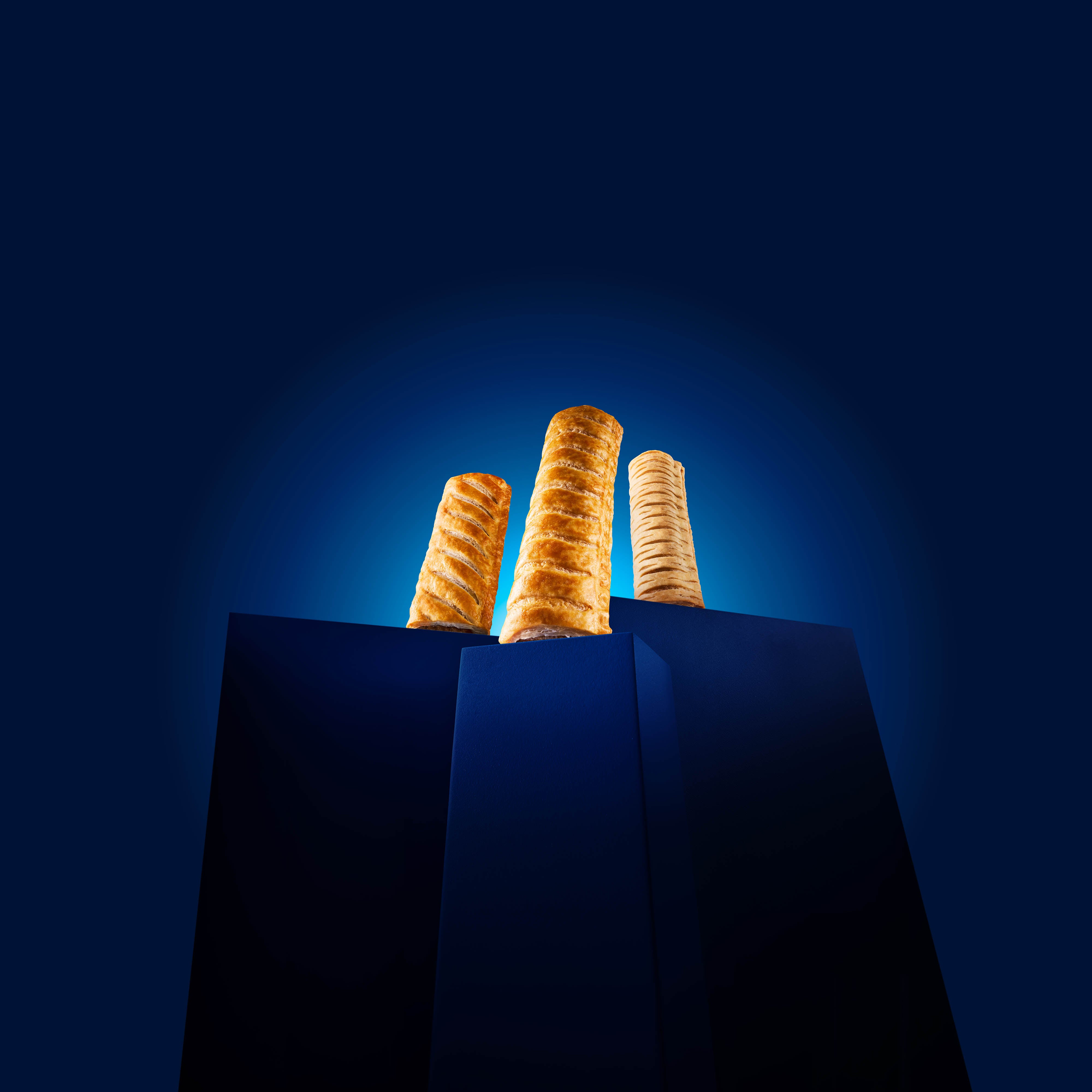 Greggs' new Chicken Roll, centre, with the Sausage Roll, left, and Vegan Roll, right