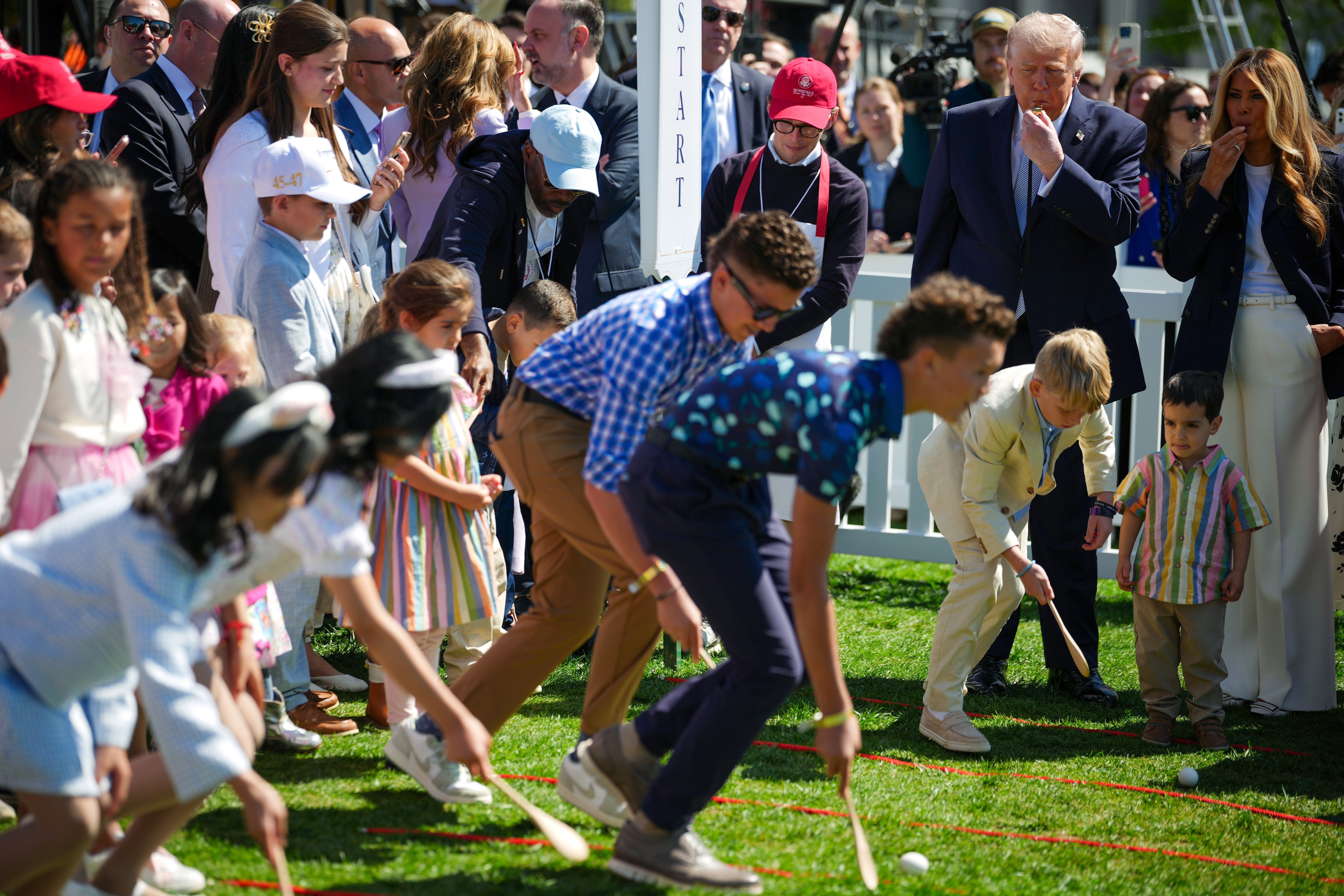 President Donald Trump and first lady Melania Trump participate in an Easter event with kids at the White House