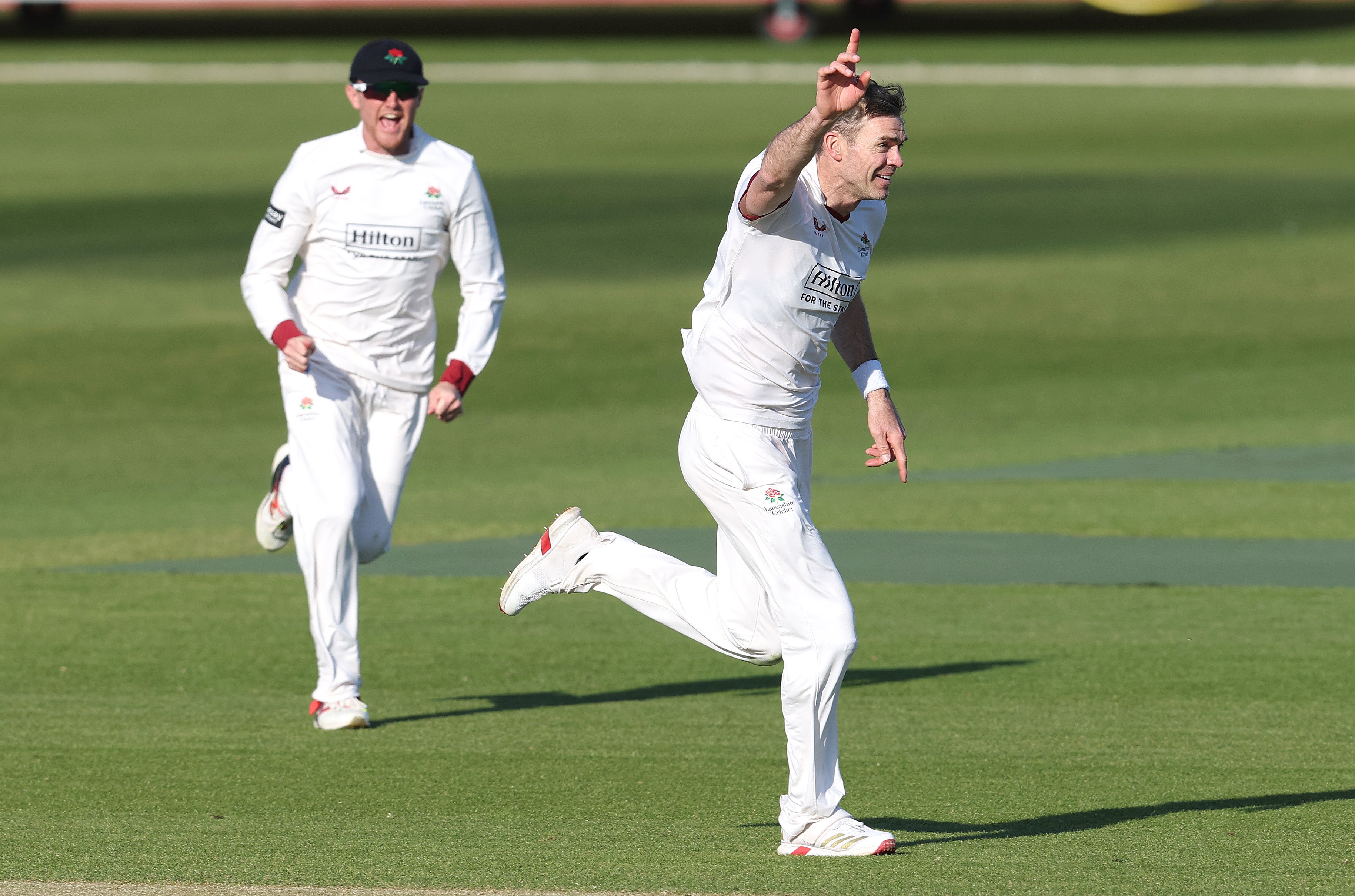 James Anderson celebrates taking a wicket for Lancashire