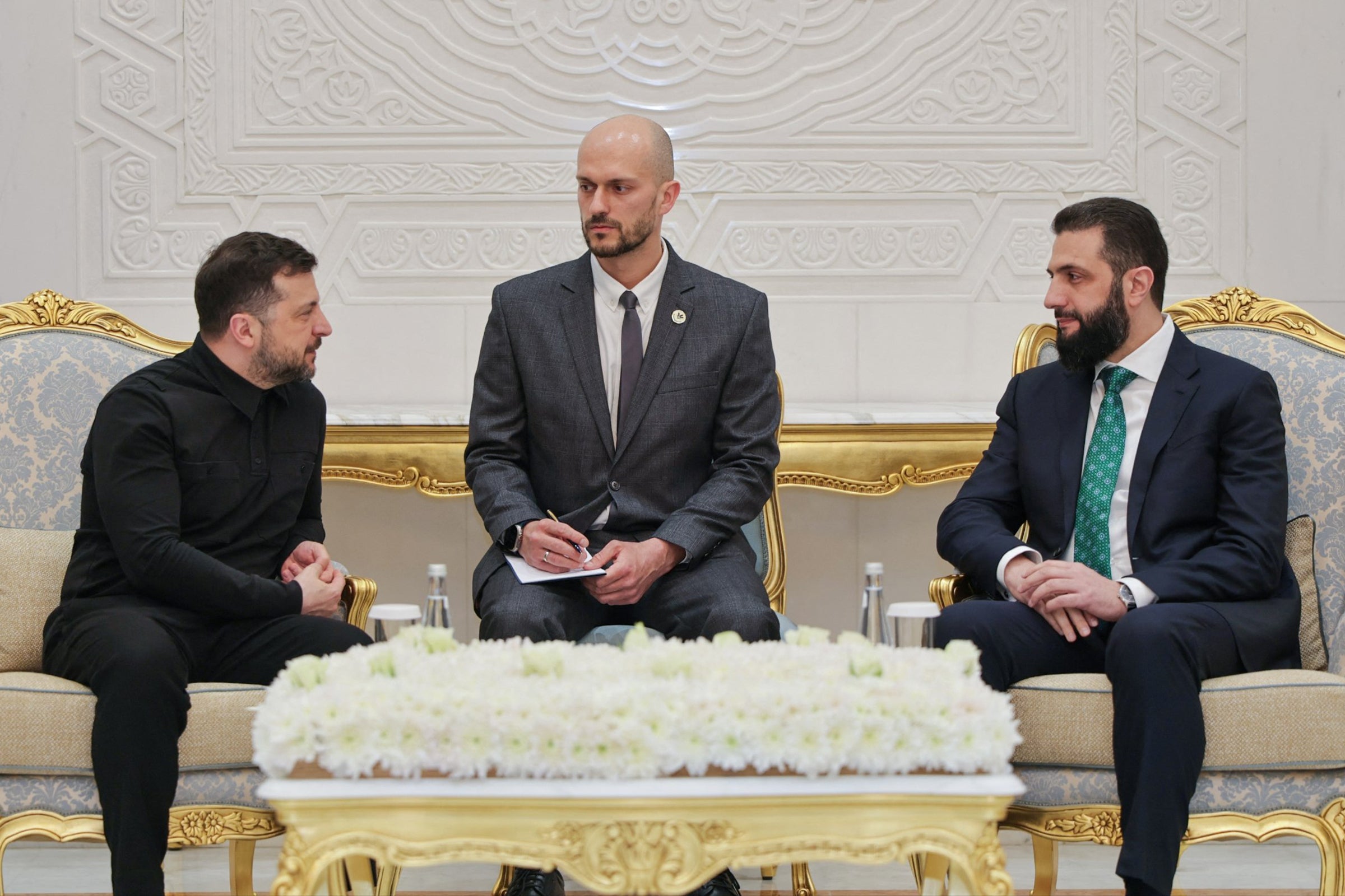 Ukraine's president Volodymyr Zelensky and Syrian president Ahmed al-Sharaa during their meeting in Damascus