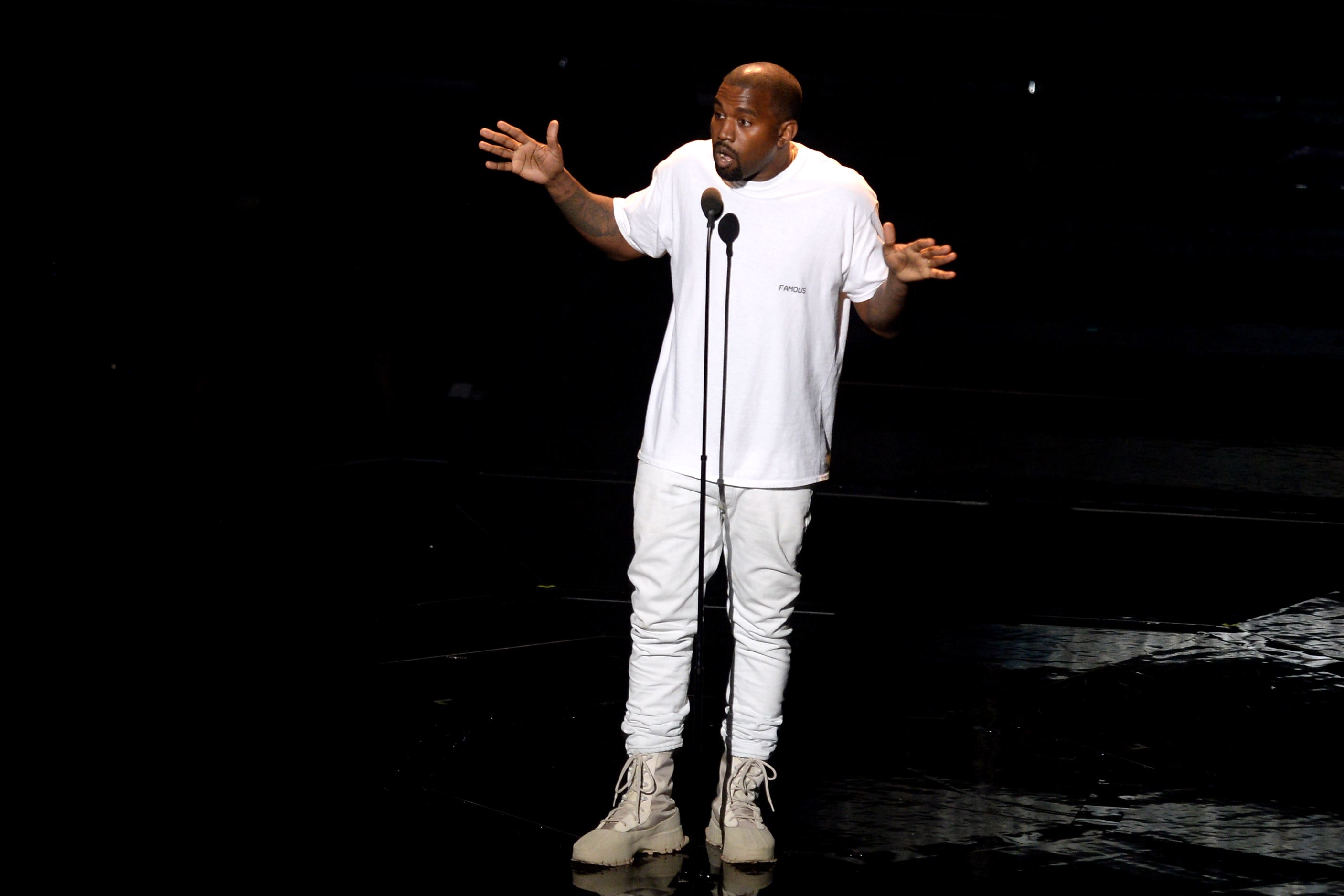 Kanye West on stage in 2016 (PA)