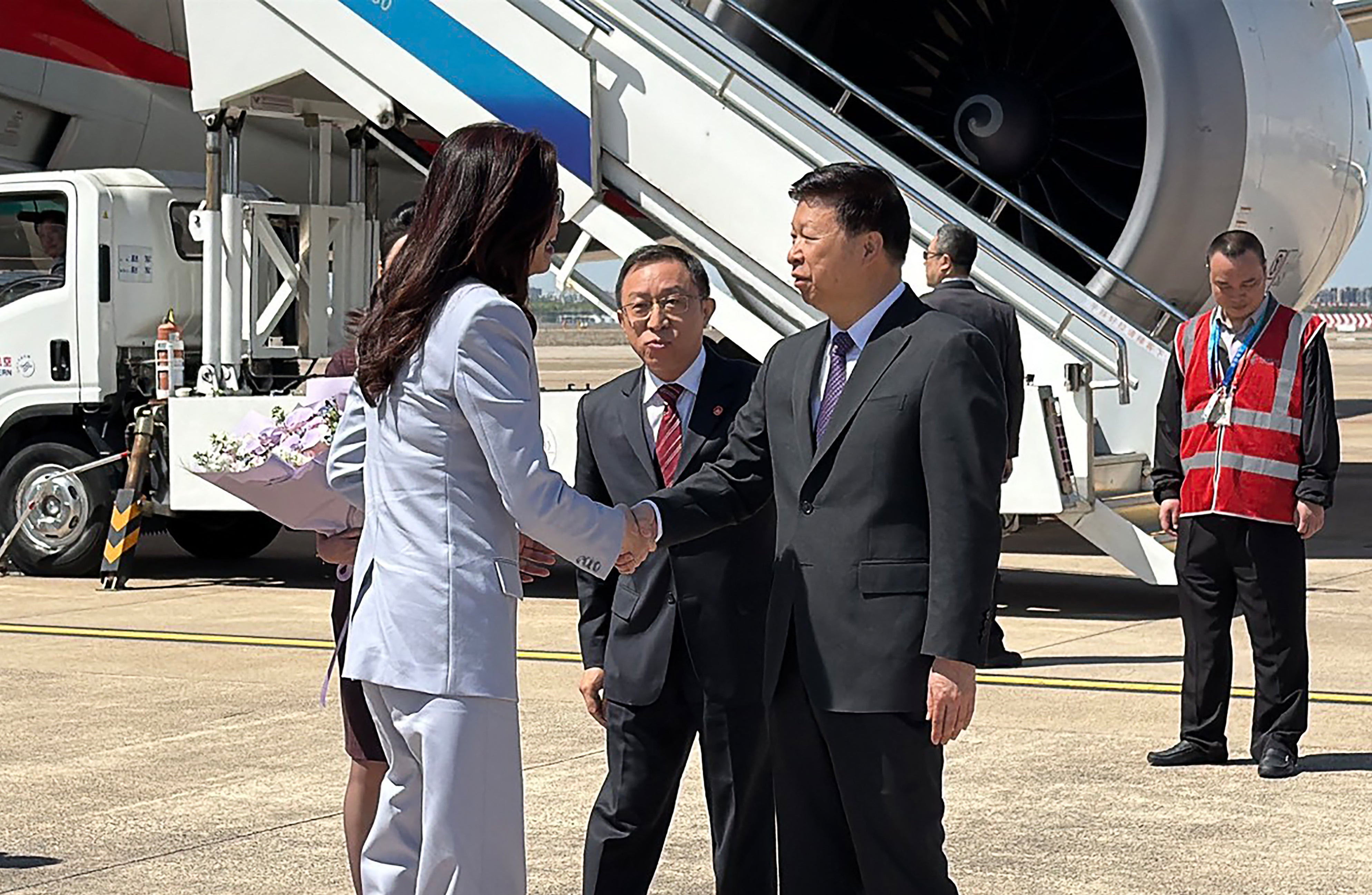 Kuomintang chairperson Cheng Li-wun shakes hands with Song Tao (R), Director of the Taiwan Work Office of the Communist Party of China (CPC) Central Committee and Taiwan Affairs Office of the State Council in Shanghai Hongqiao International Airport