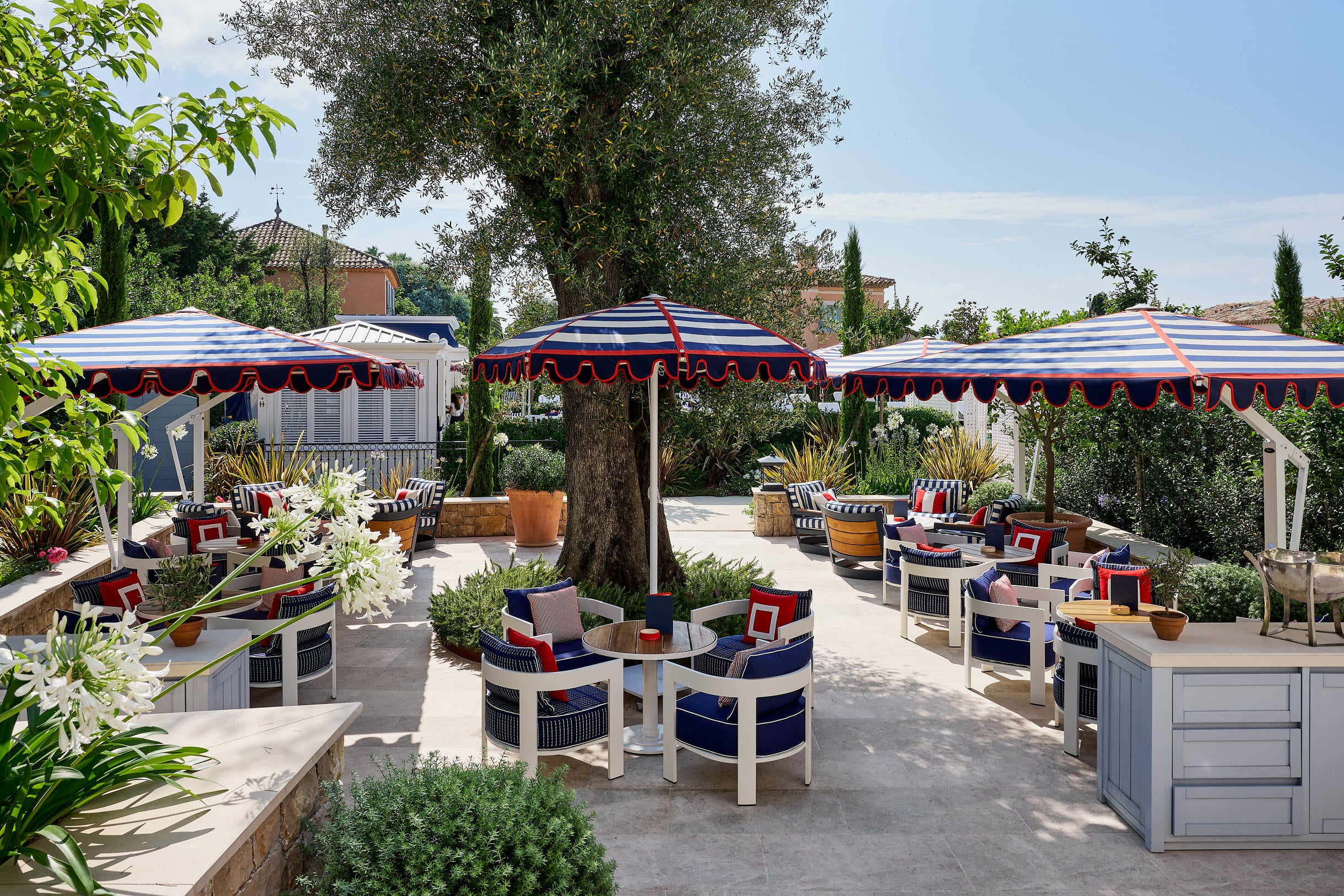 The champagne lounge terrace offers a charming al fresco setting for cocktails, breakfast, lunch and dinner