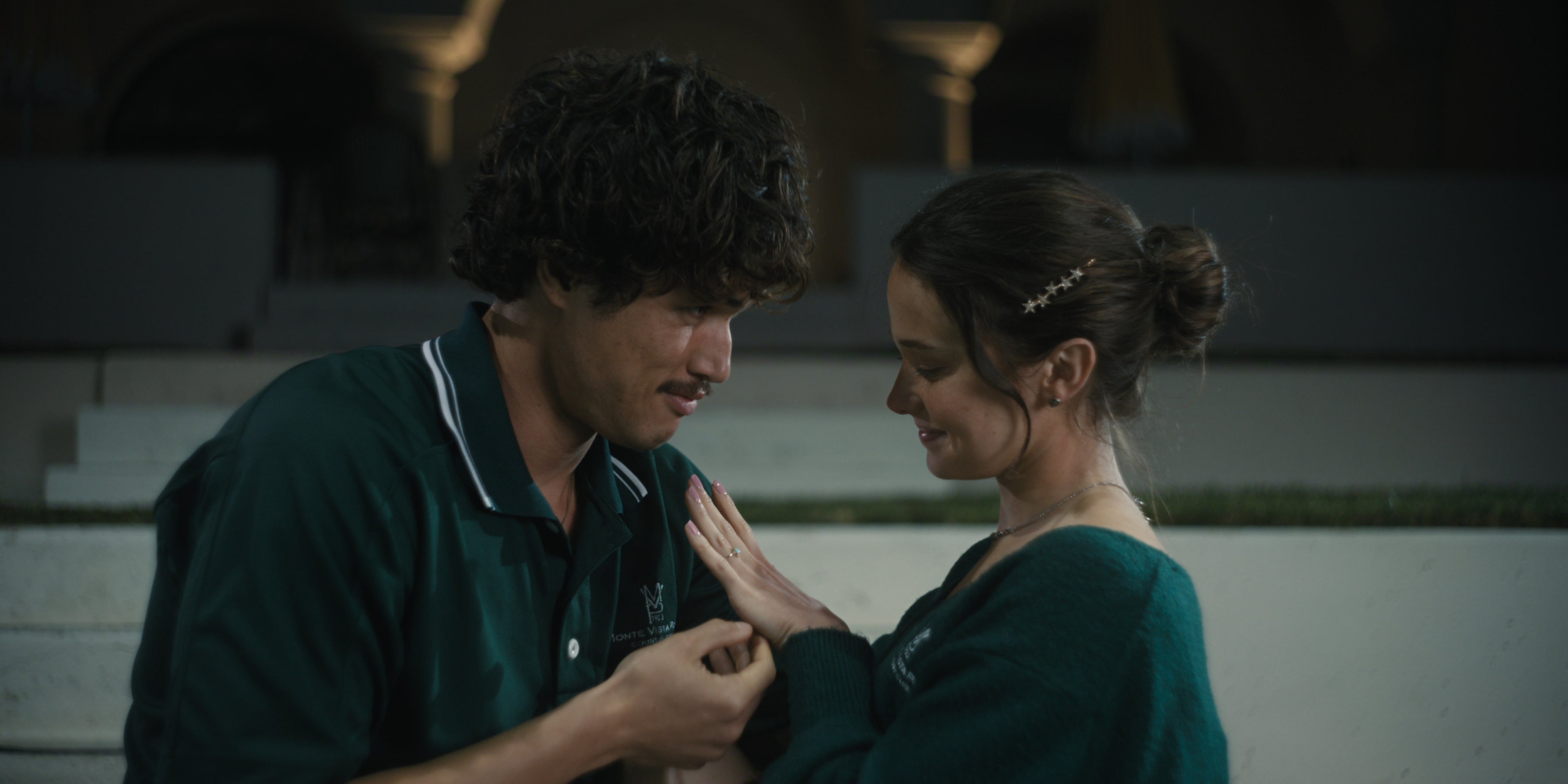 Charles Melton and Cailee Spaeny play a young, naive couple, whose relationship is harmed by