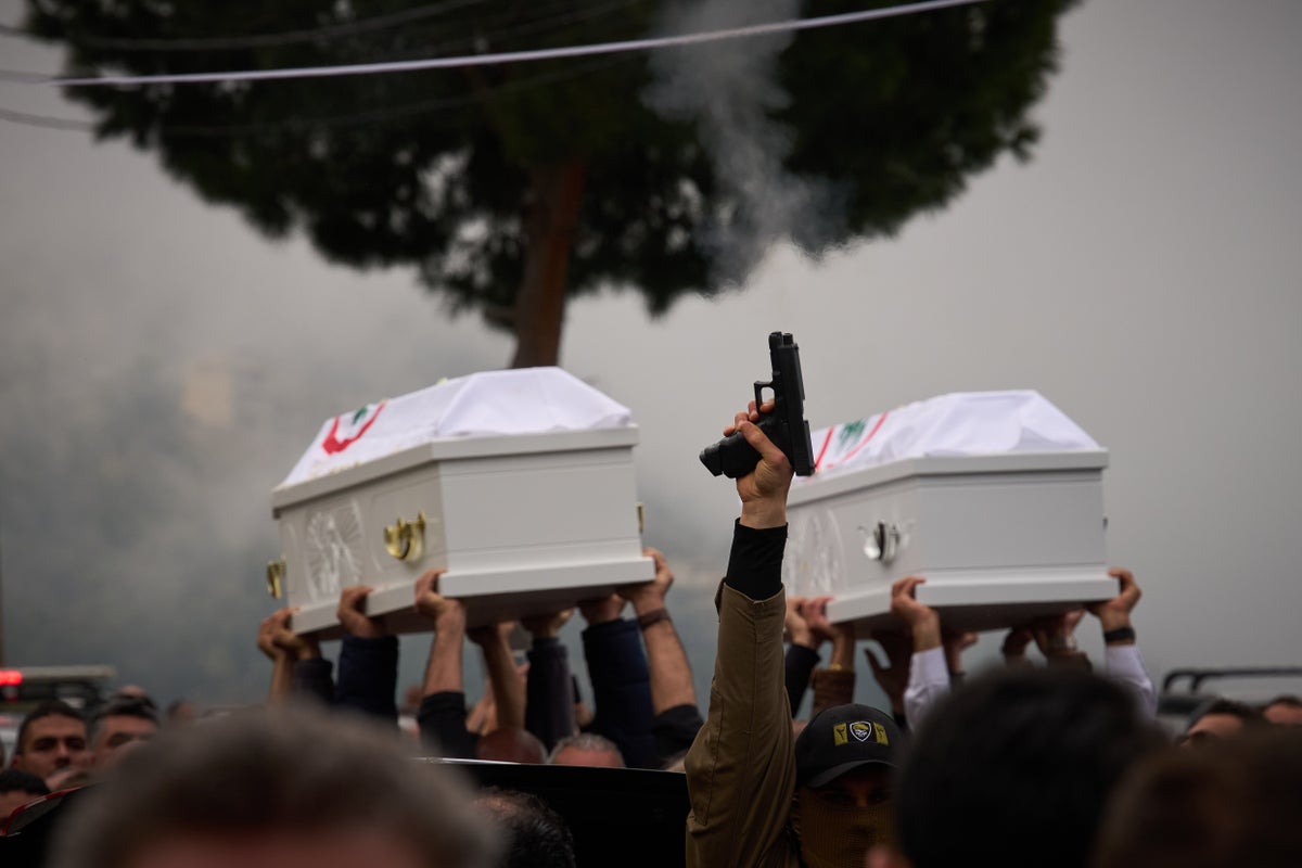 Lebanon buries a Christian official killed in an Israeli strike as anti-Hezbollah anger surges