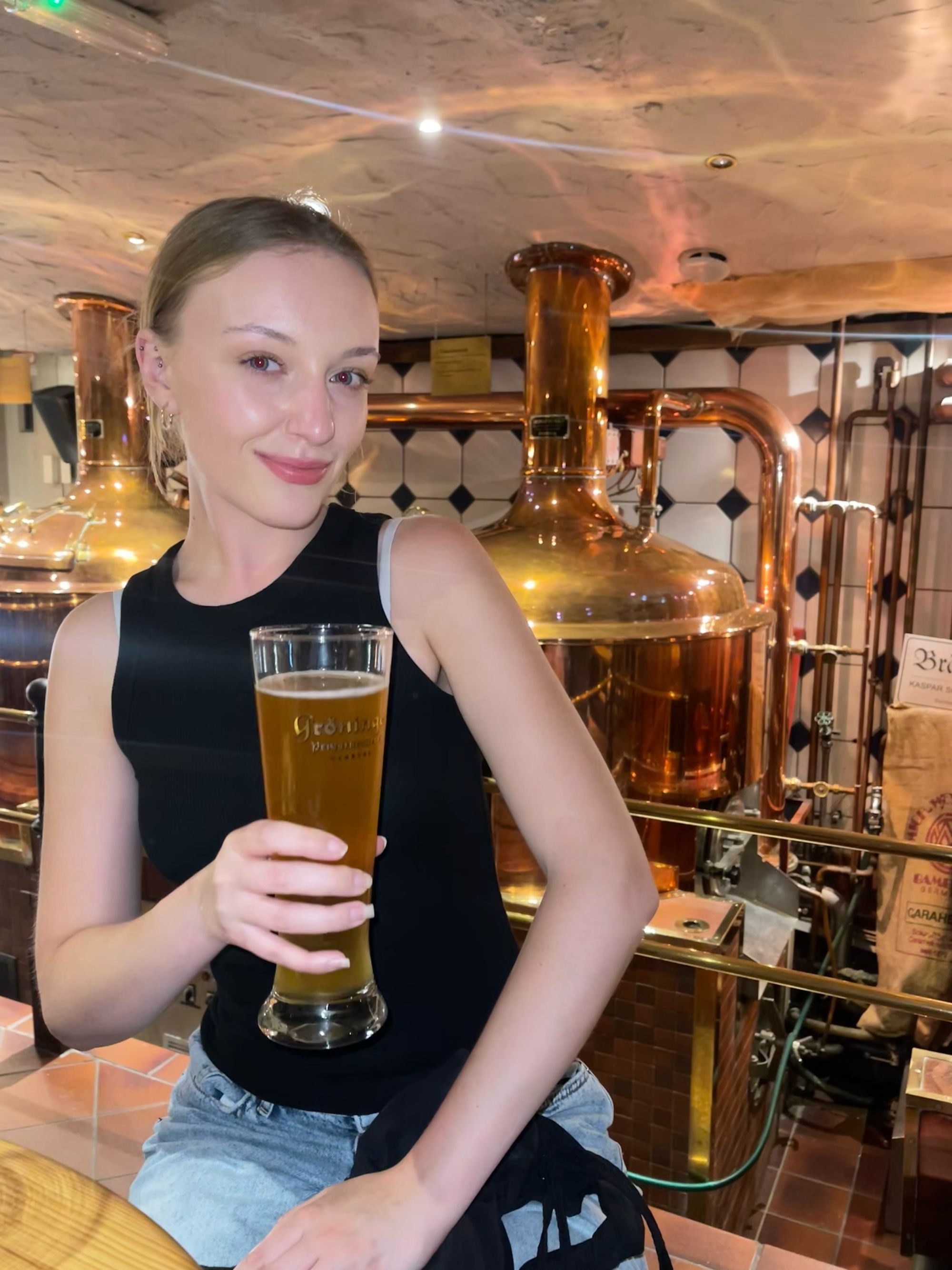 Layla enjoyed a pint of pilsner at a historic brewery