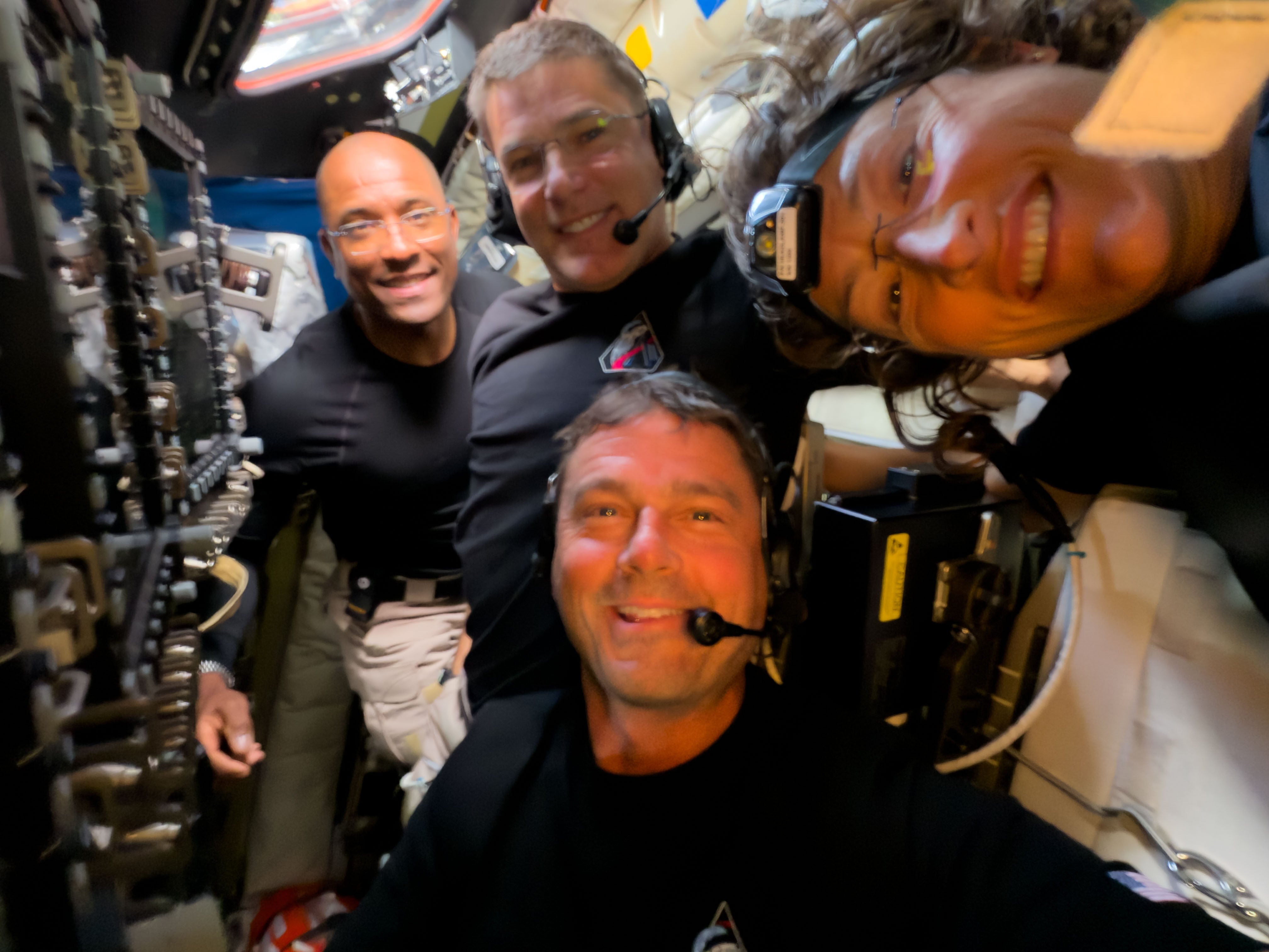 The four astronauts set a new record for how far humans have travelled from Earth, reaching a maximum distance of 406,771 kilometres from our home planet.