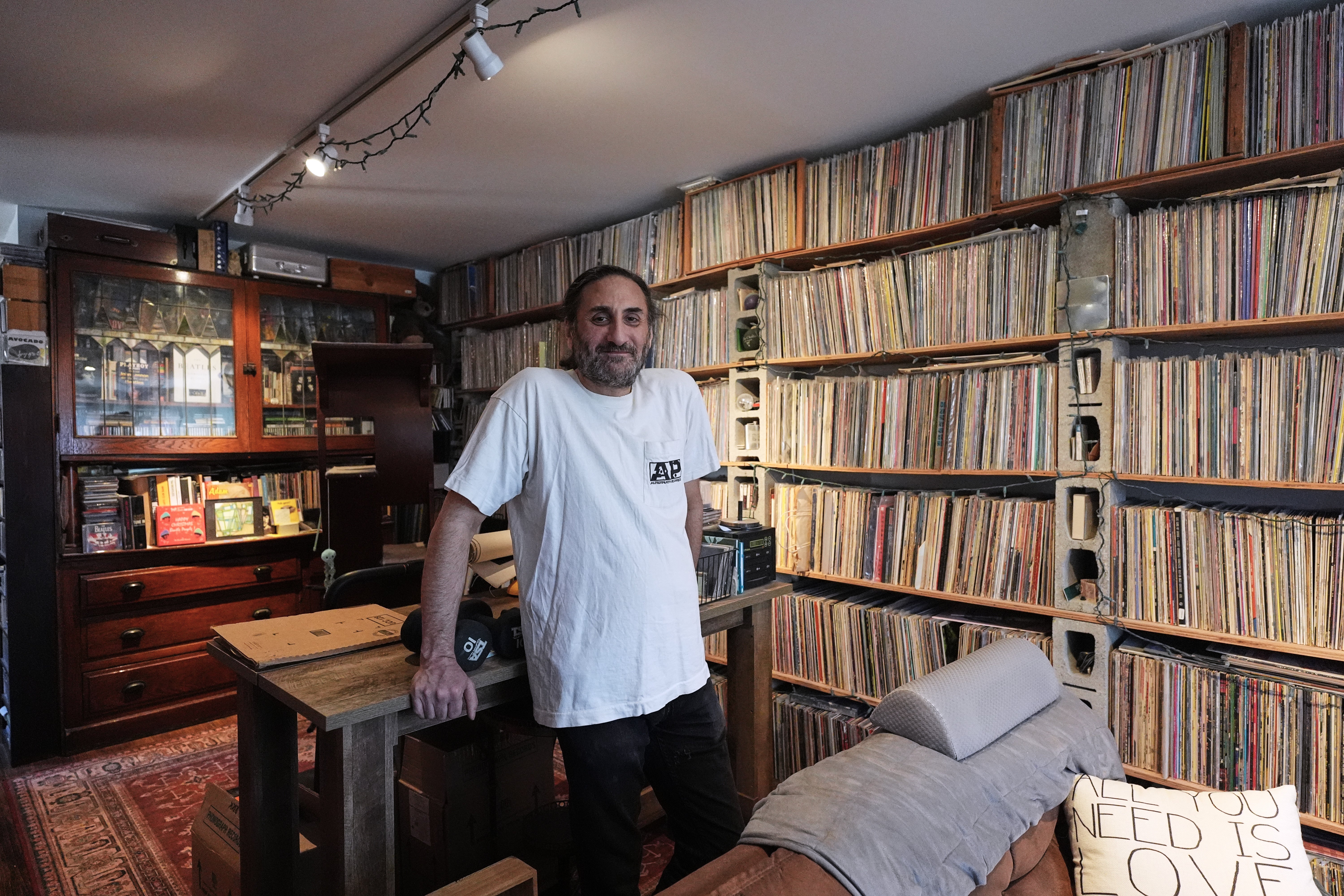 Aadam Jacobs with his record library