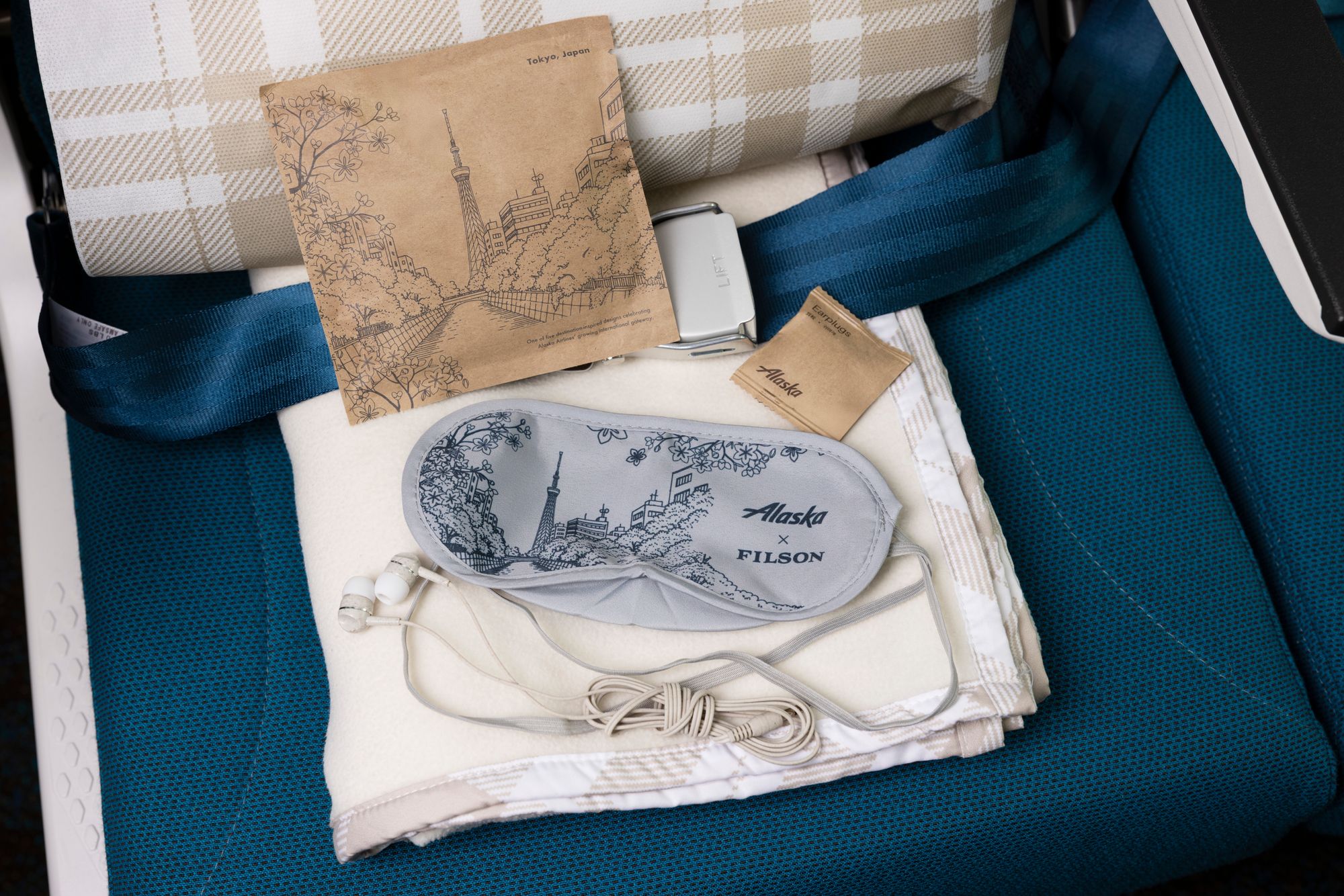 The exclusive amenity kit includes Salt & Stone skincare products and other travel essentials