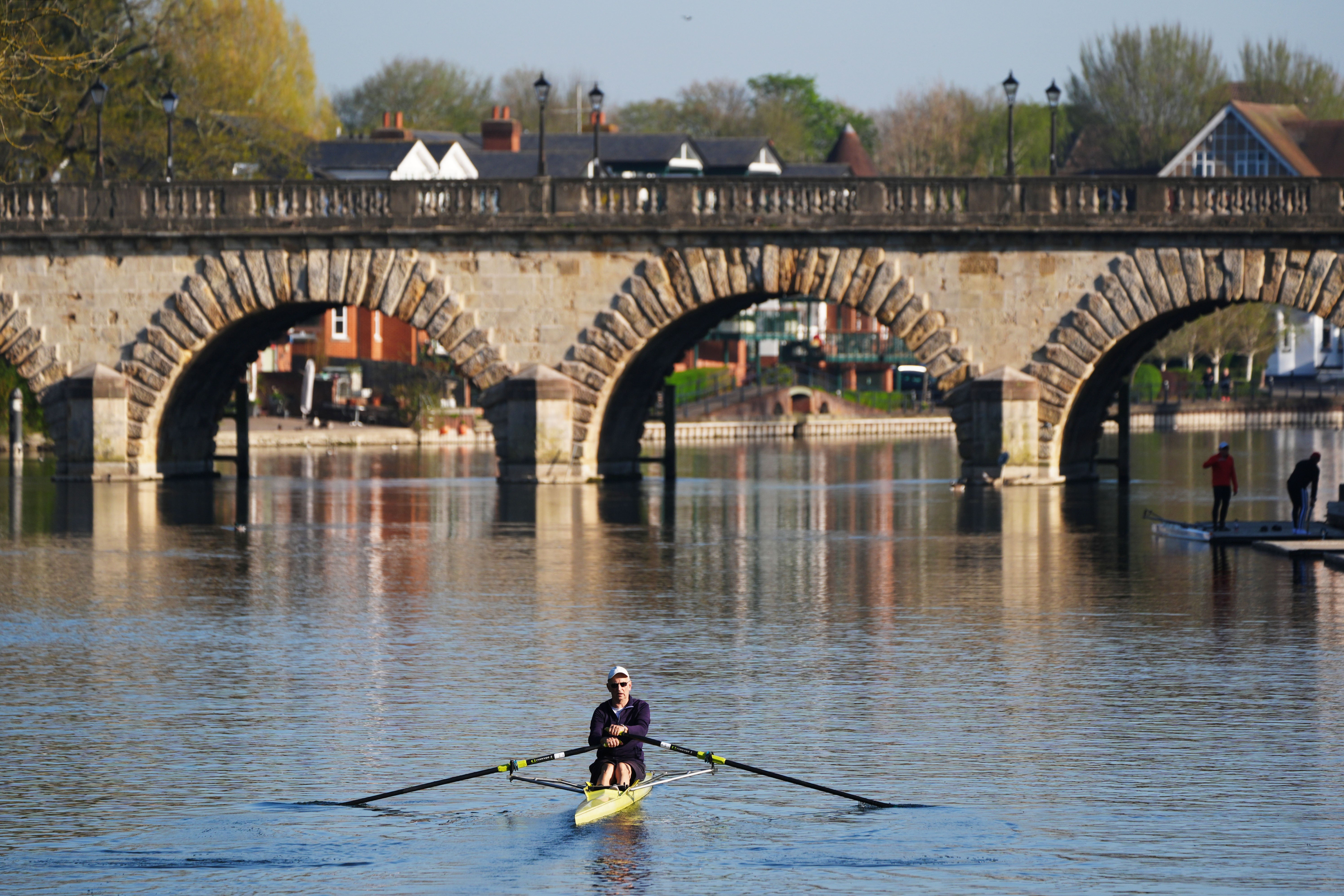 A rower travels along the Thames near Maidenhead, Berkshire