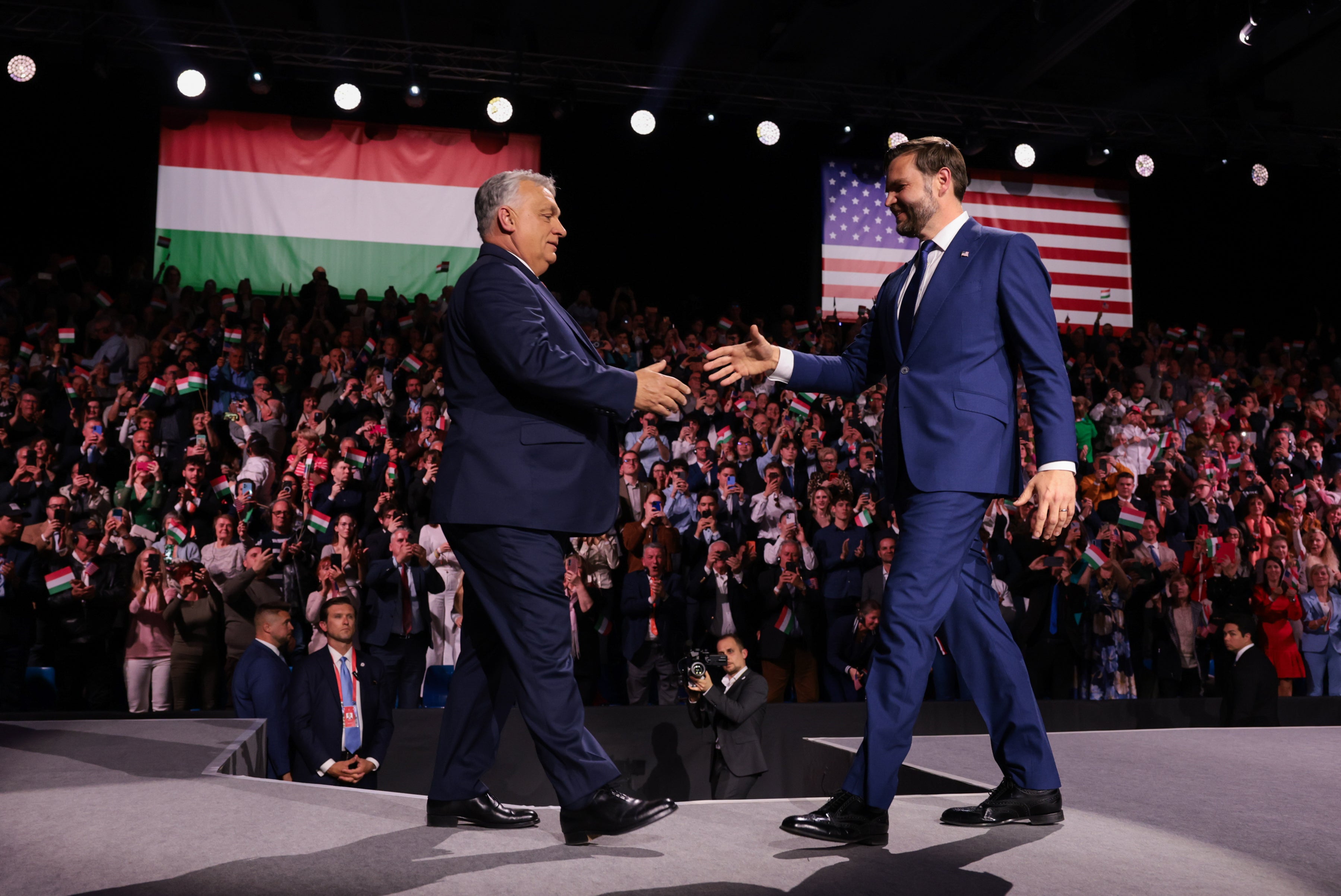Ukraine-Russia war latest: Moscow threatens to attack Baltic countries allowing Kyiv to use airspace for drones 4 JD Vance shakes hands with Hungarian prime minister Viktor Orban during a rally in Budapest