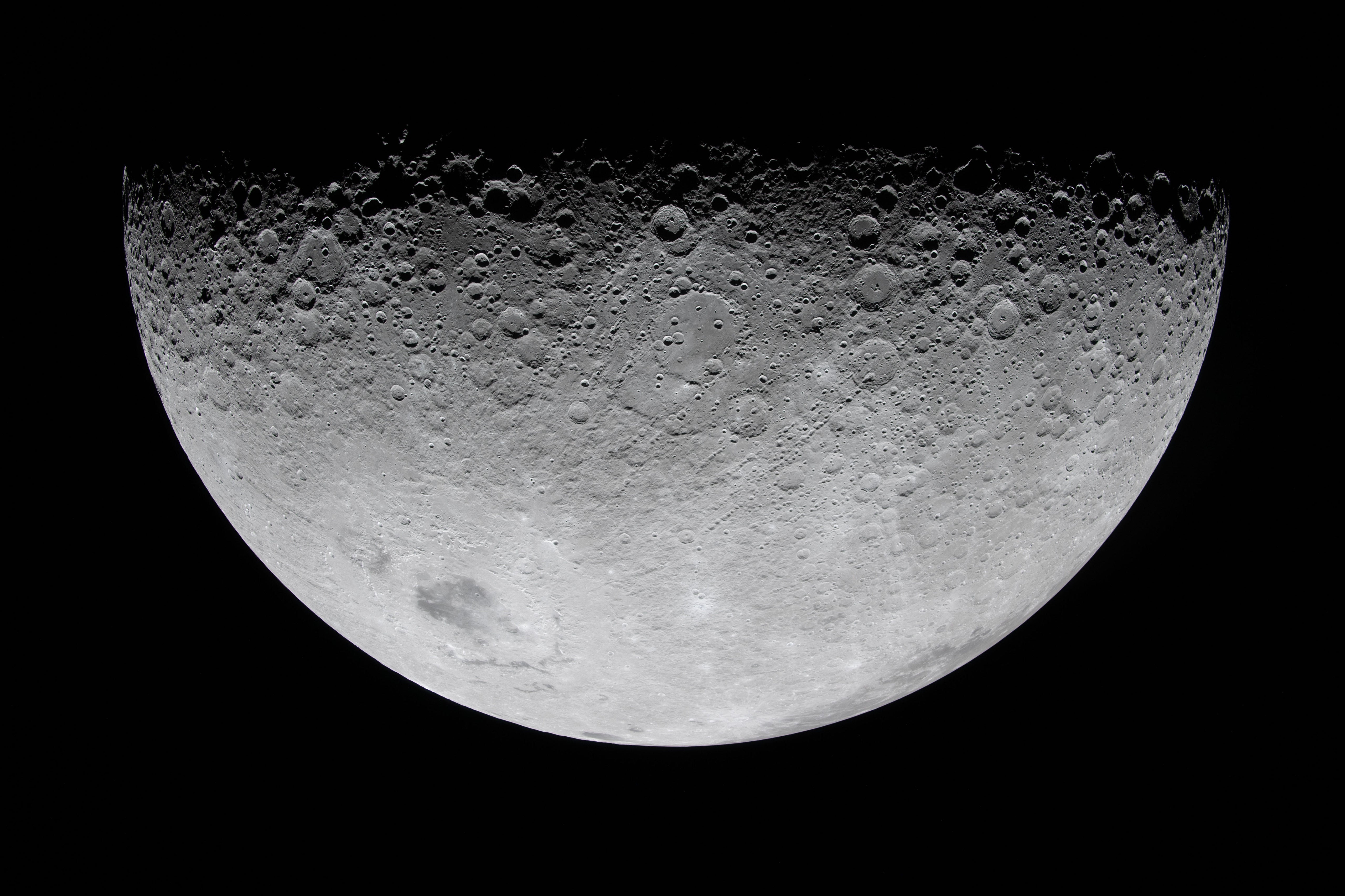 Craters are seen on the moon in this dramatic shot captured by the Artemis II crew