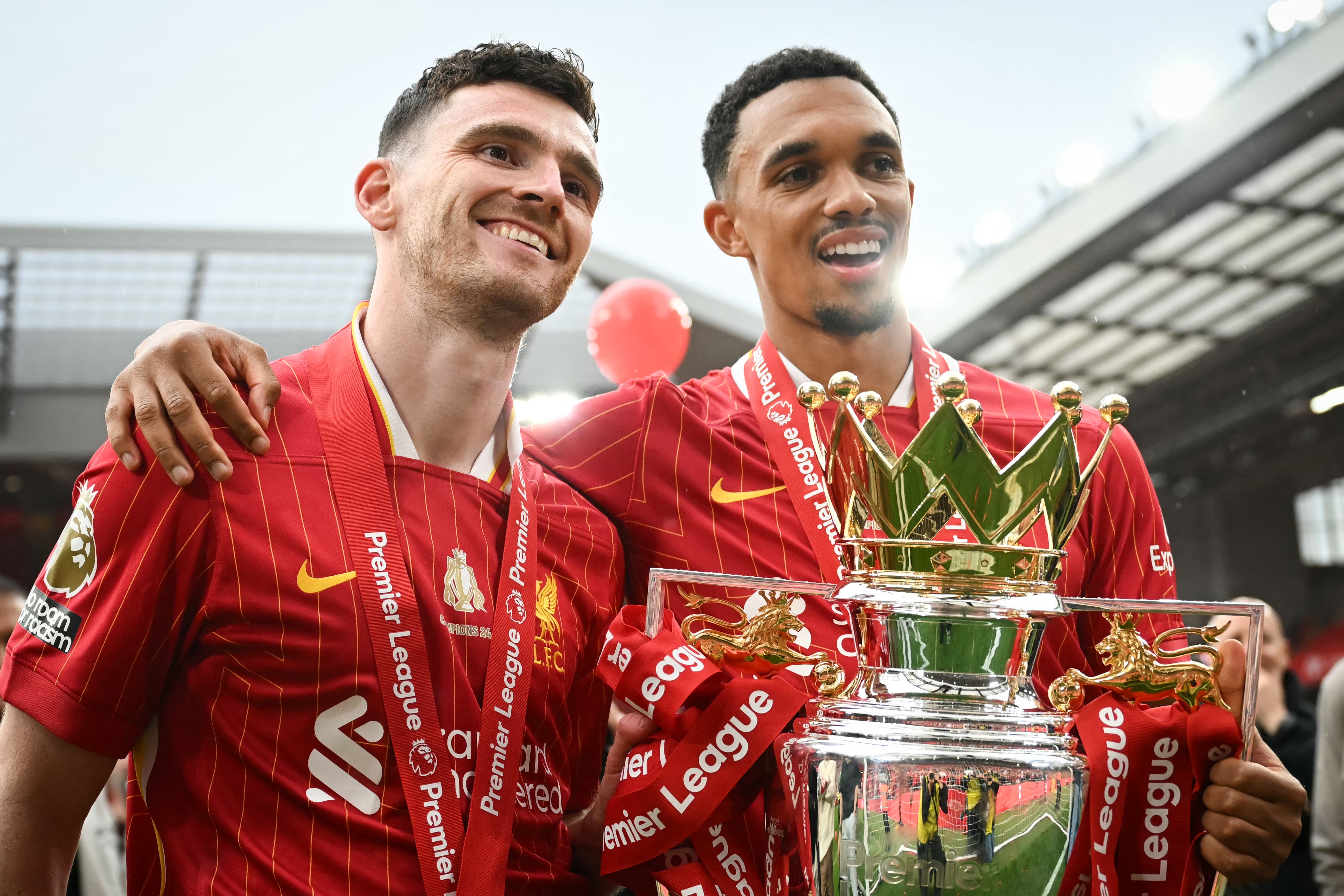 Andy Robertson (left) helped Liverpool to Premier League success last season (AFP/Getty)