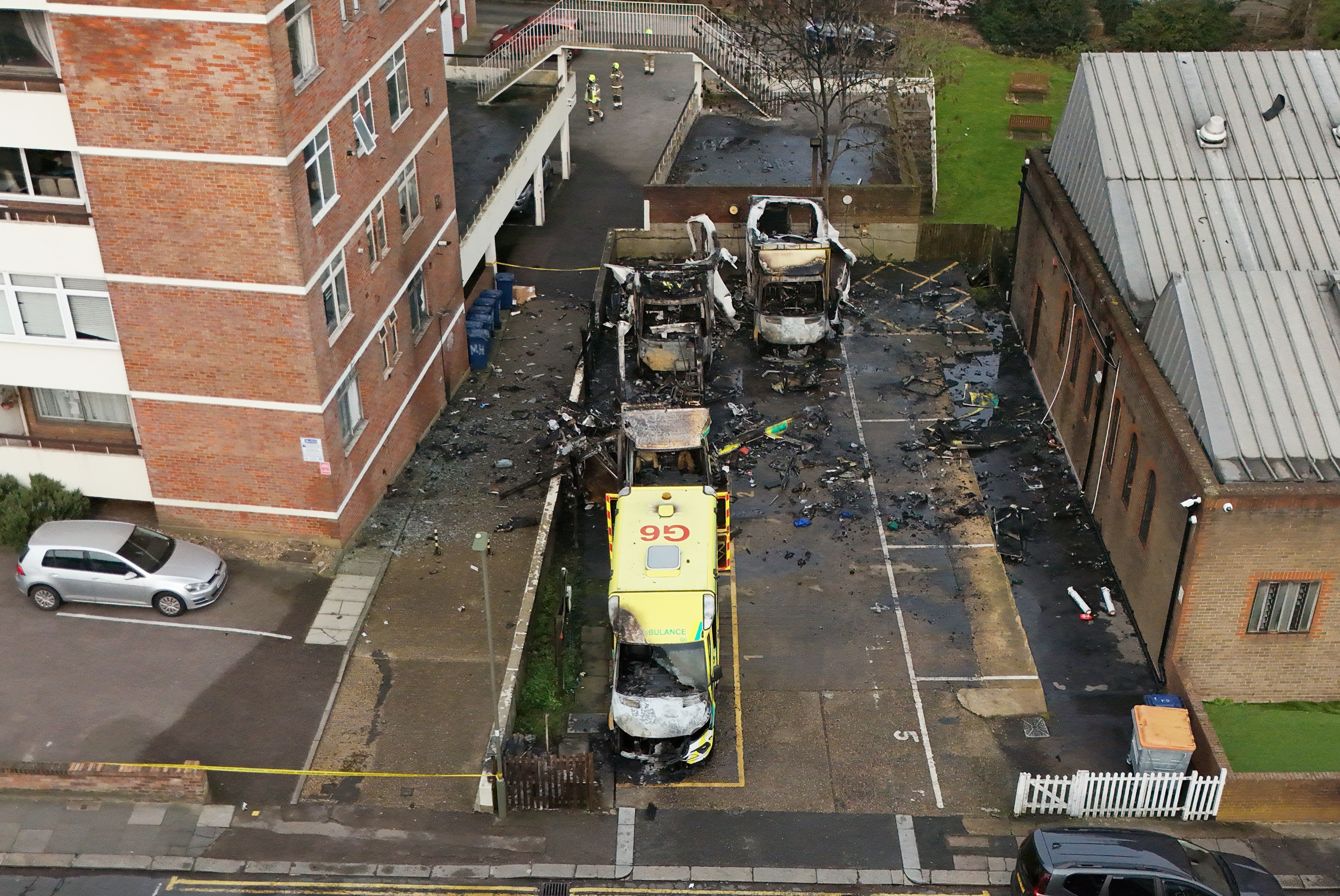 Firefighters at the scene in Highfield Road, Golders Green (Jonathan Brady/PA)