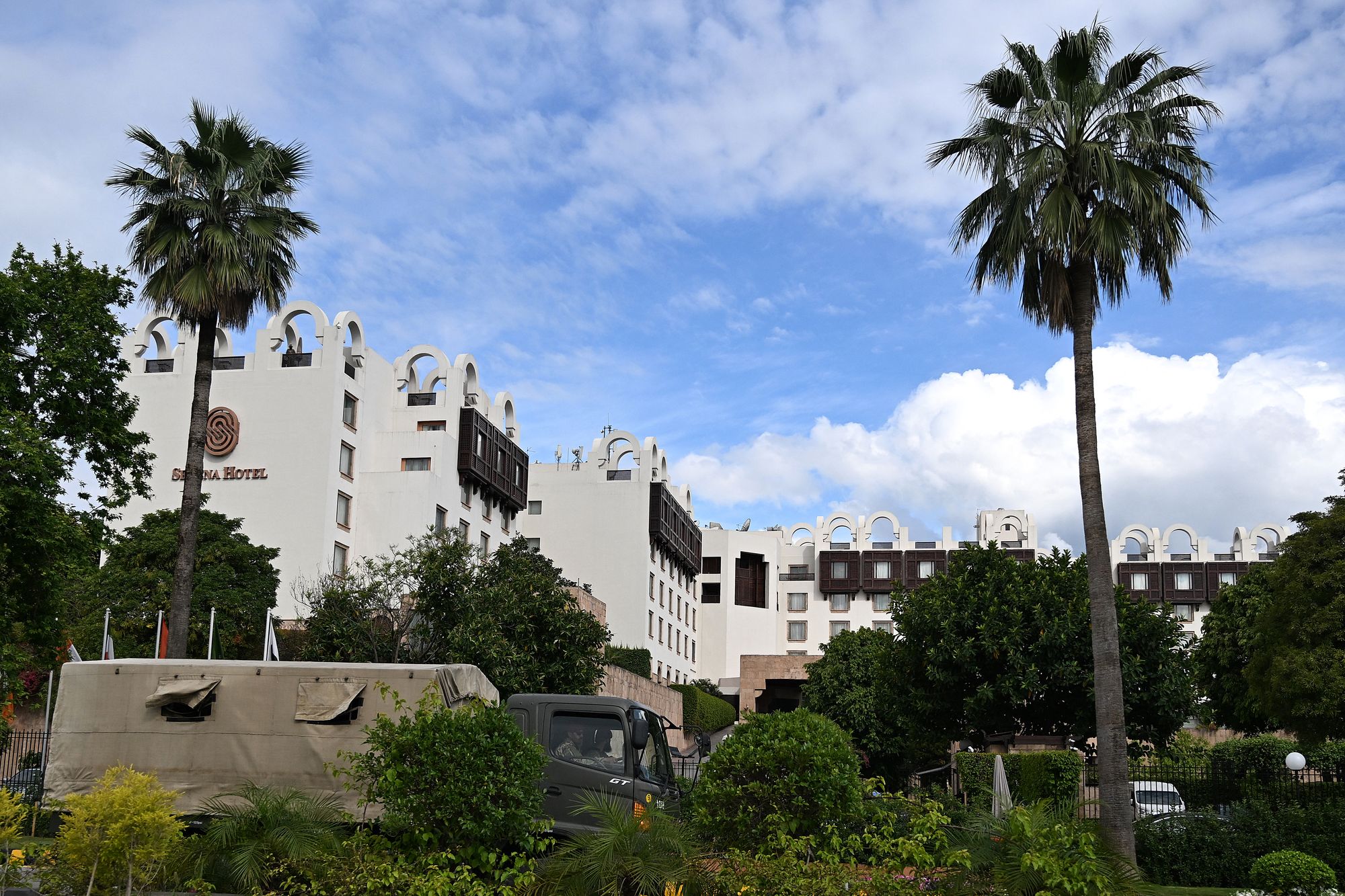 An army truck drives past Serena Hotel in Islamabad