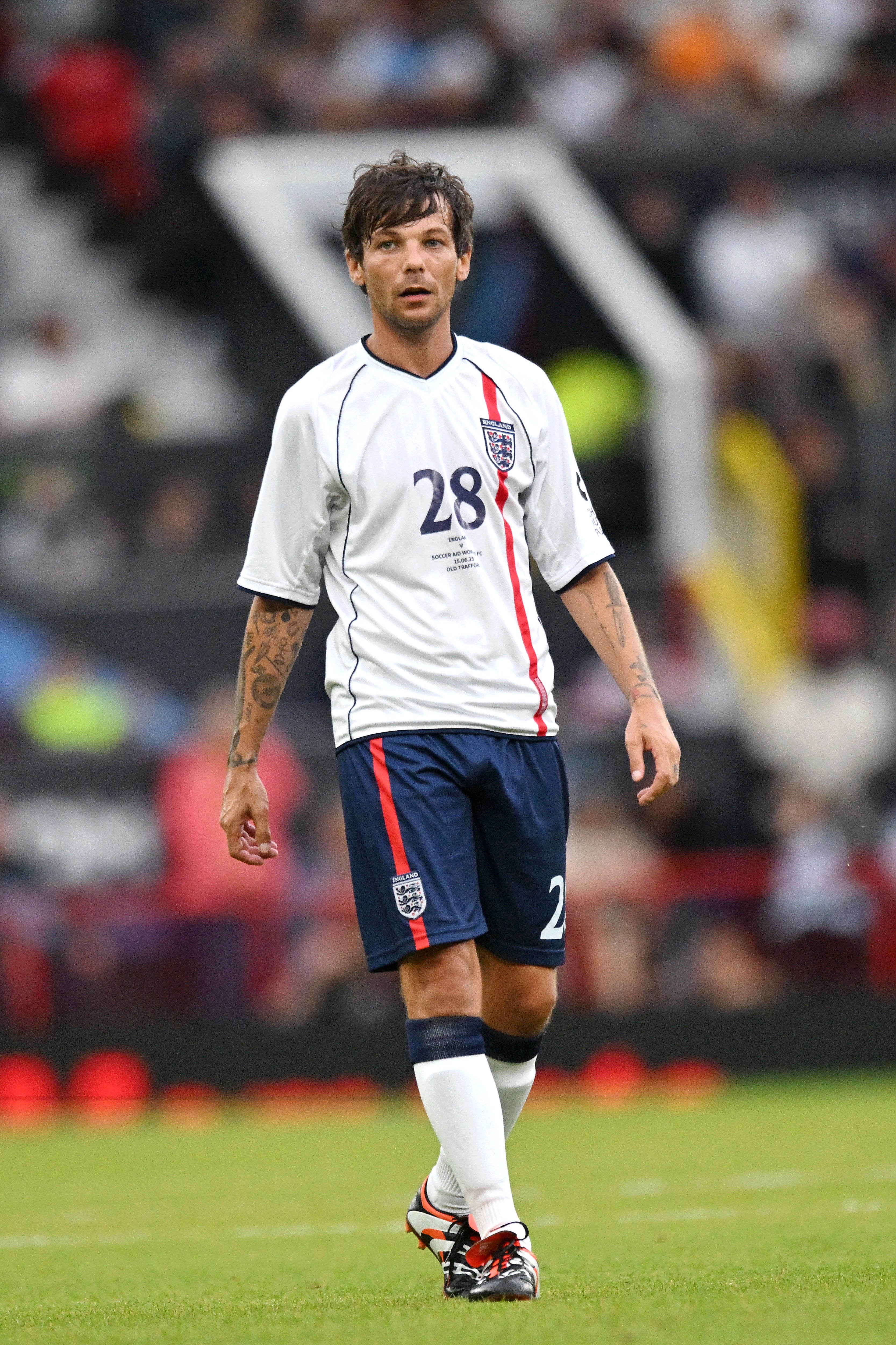 Louis Tomlinson playing in a Soccer Aid match in 2025